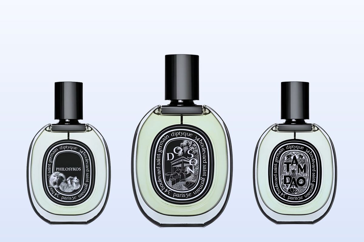 Three fragrance bottles, Philosykos, Do Son and Tam Dao, on a pale blue background