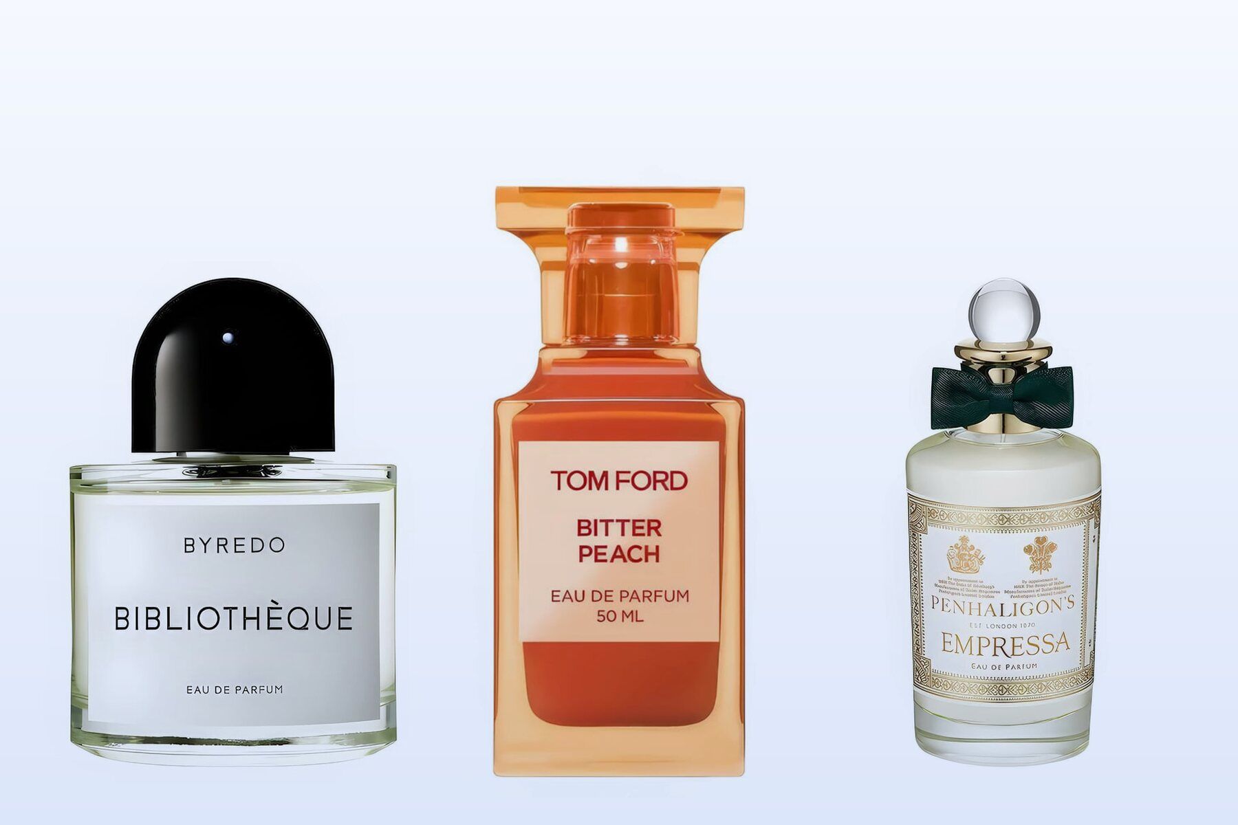 Three bottles on a pale blue background, Bibliothèque by Byredo, Bitter Peach by Tom Ford and Empressa by Penhaligon's