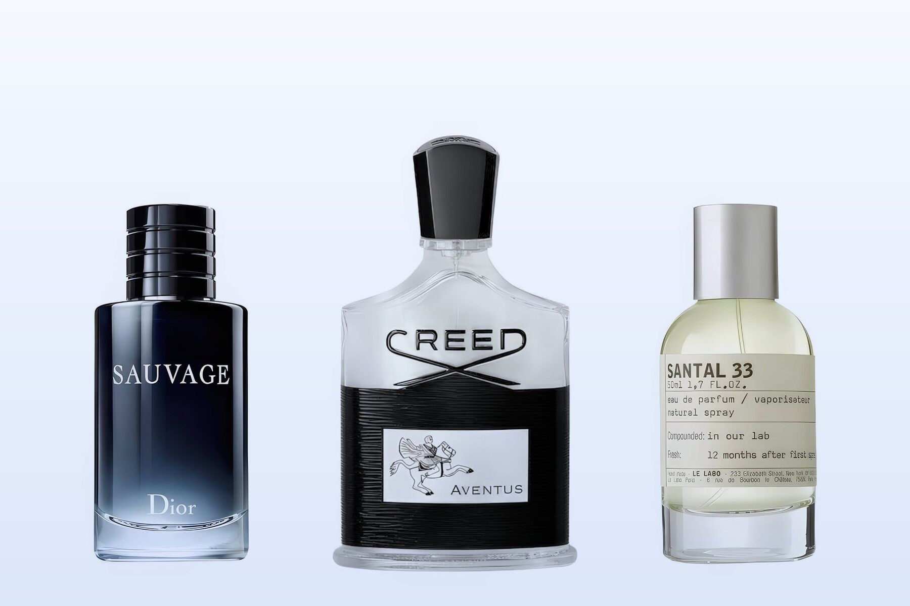 Three fragrance bottles, Sauvage, Aventus and Santal 33, on a pale blue background
