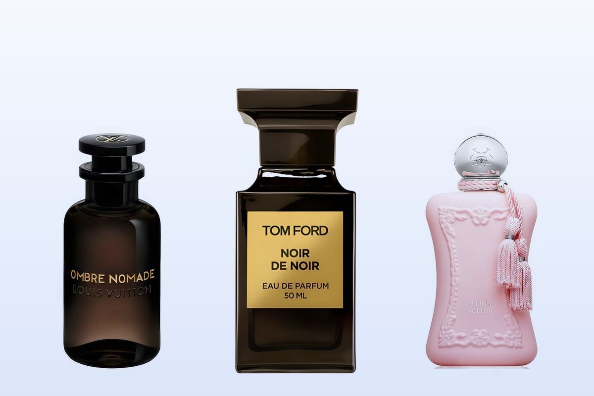 Louis Vuitton Ombre Nomade, Tom Ford Noir de Noir and Parfums de Marly Delina Exclusif on a pale blue background