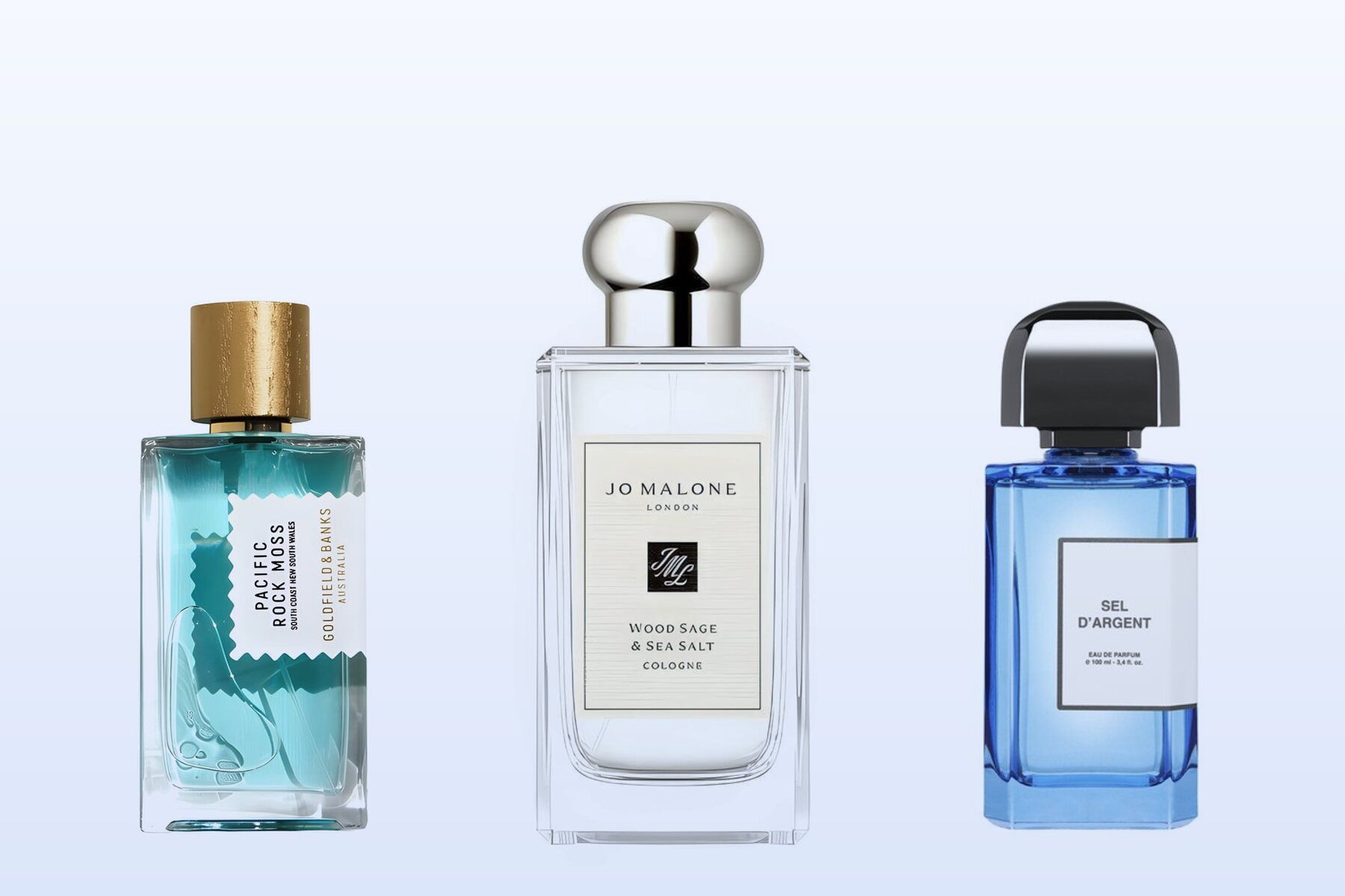 Pacific Rock Moss της Goldfield & Banks, Wood Sage & Sea Salt της Jo Malone London και Sel d'Argent της BDK Parfums σε απαλό γαλάζιο φόντο