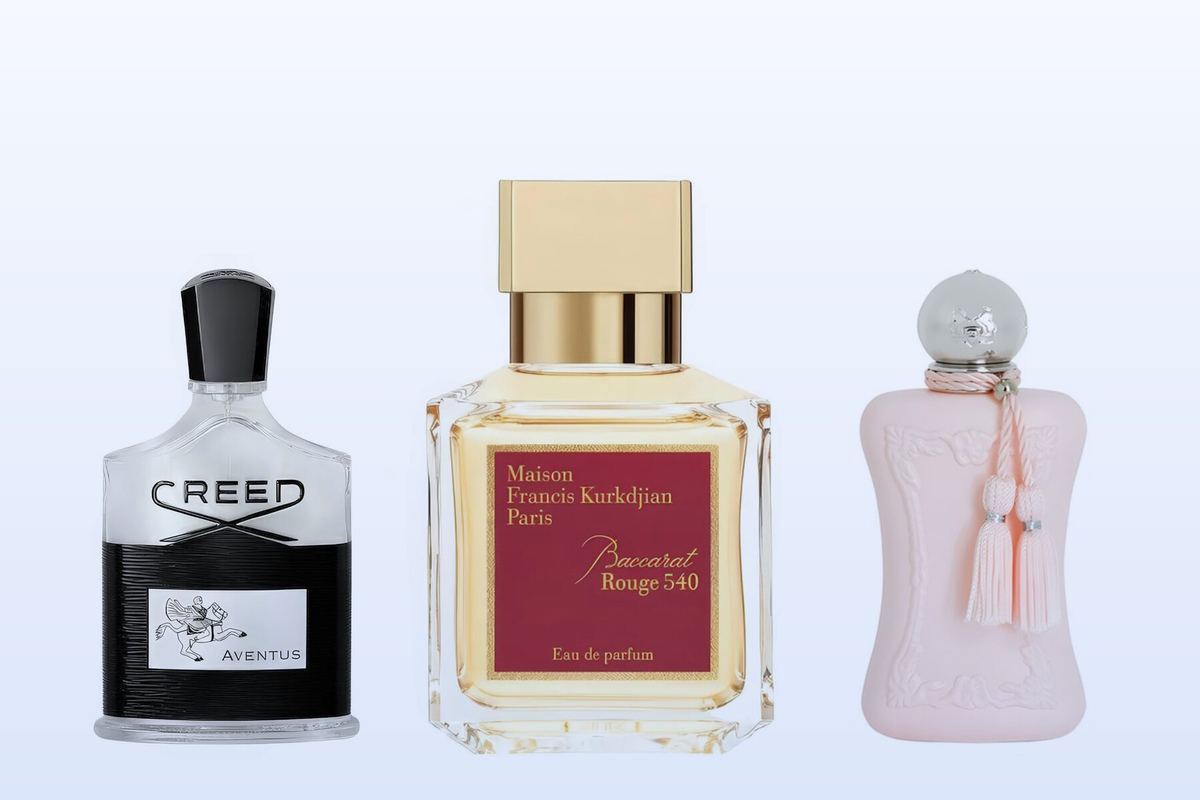 Three bottles, Aventus, Baccarat Rouge 540 and Delina, on a pale blue background