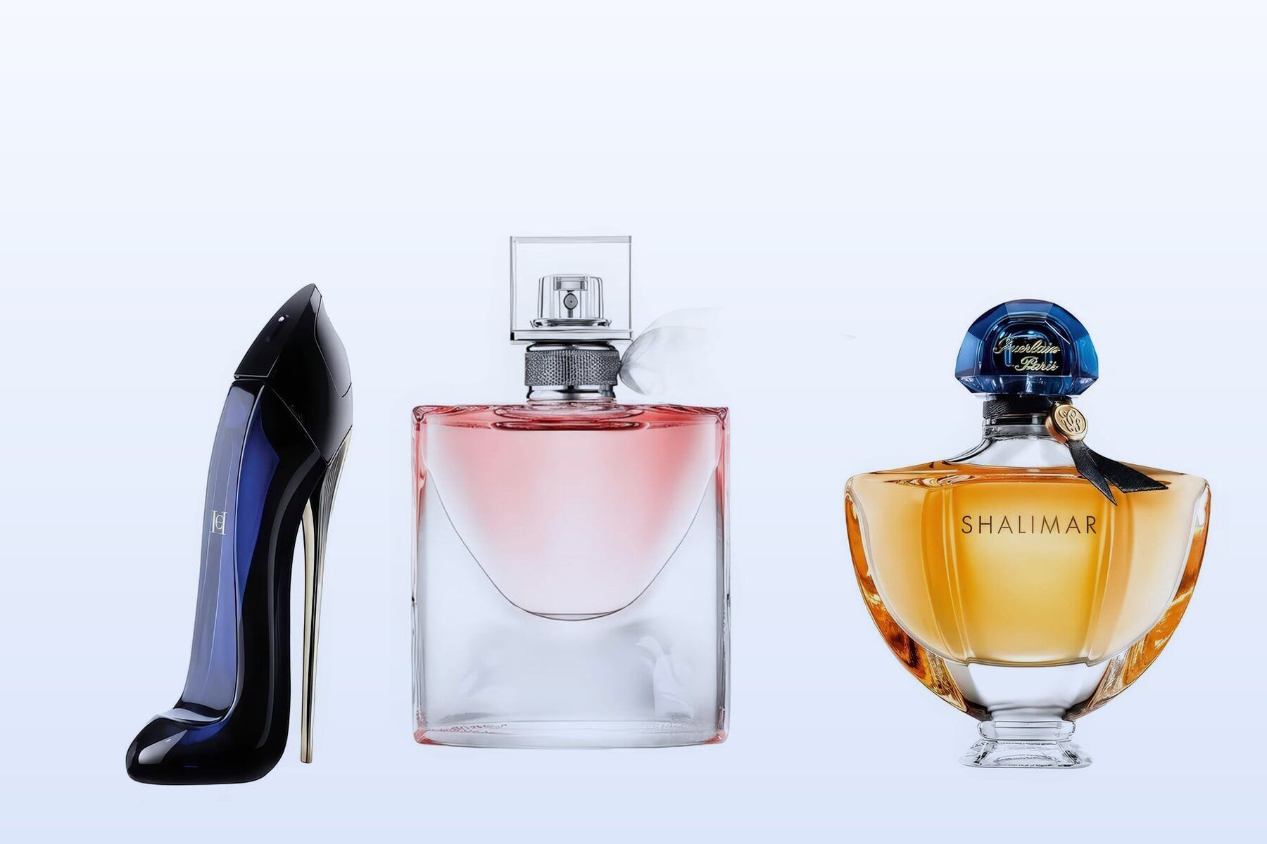 Three fragrance bottles, Good Girl, La Vie Est Belle and Shalimar Eau de Parfum, on a pale blue background