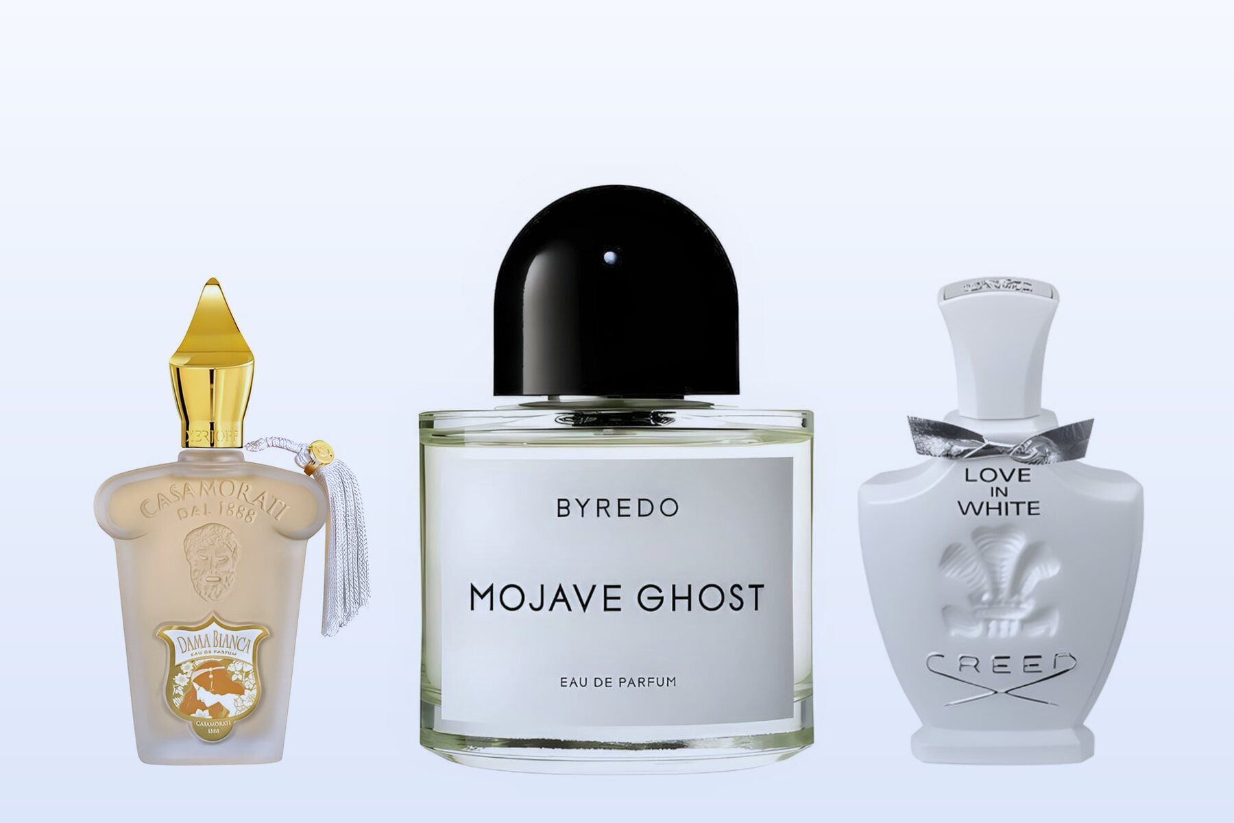Three bottles on a pale blue background, Dama Bianca, Mojave Ghost and Love in White