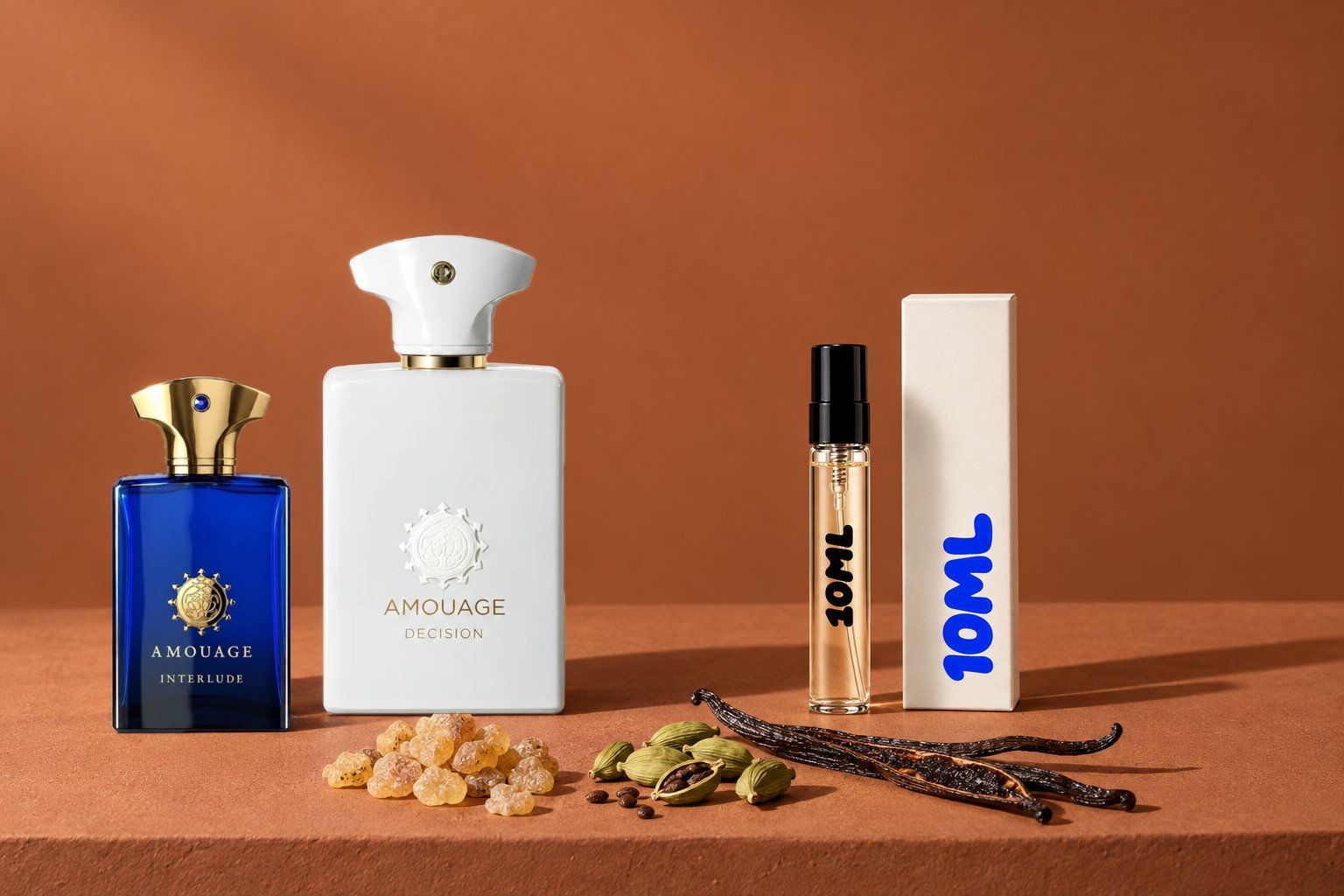 Decision and Interlude Man by Amouage next to a 10ML decant, with frankincense, cardamom and vanilla, the key notes of Decision