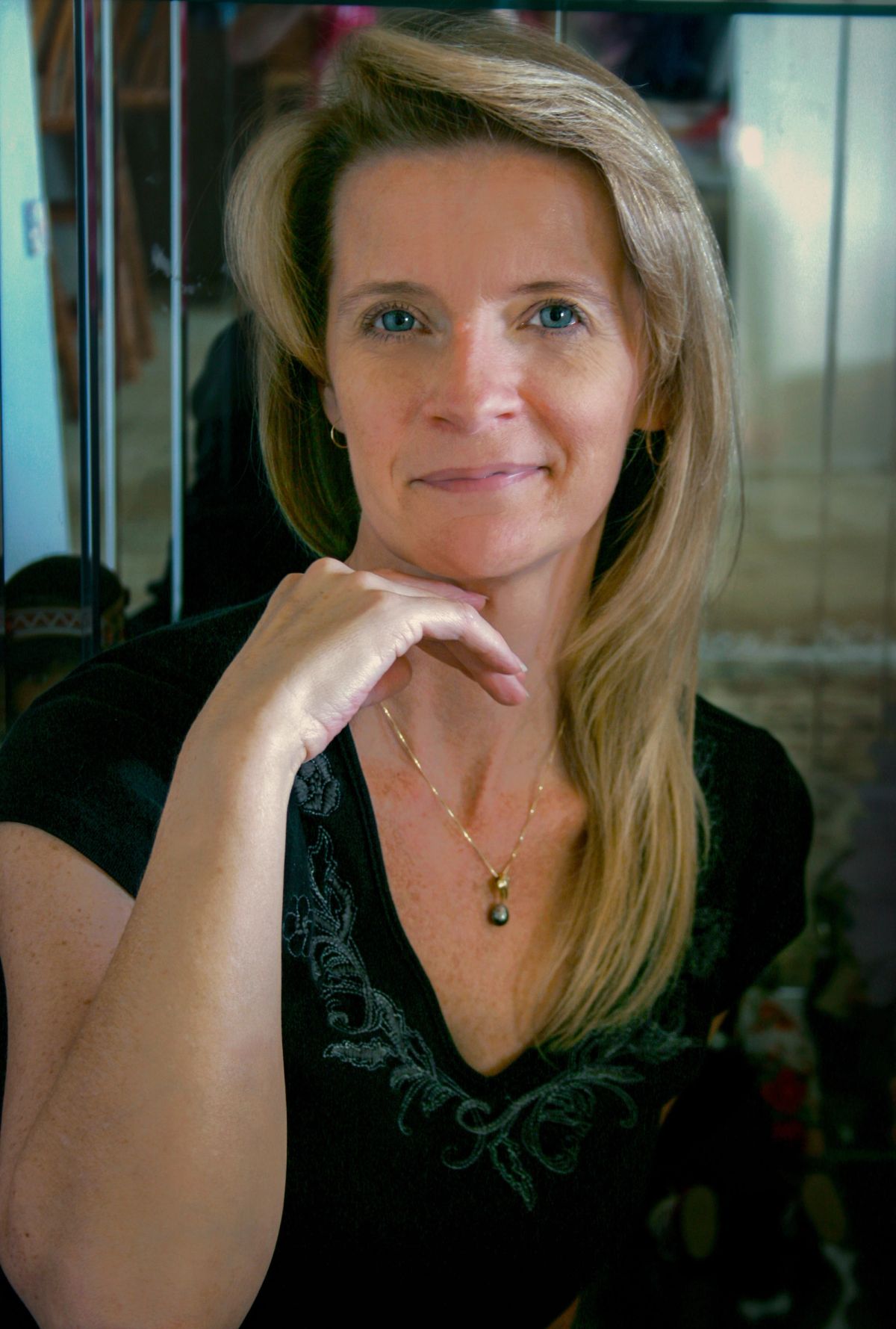 A portrait image of a woman business owner