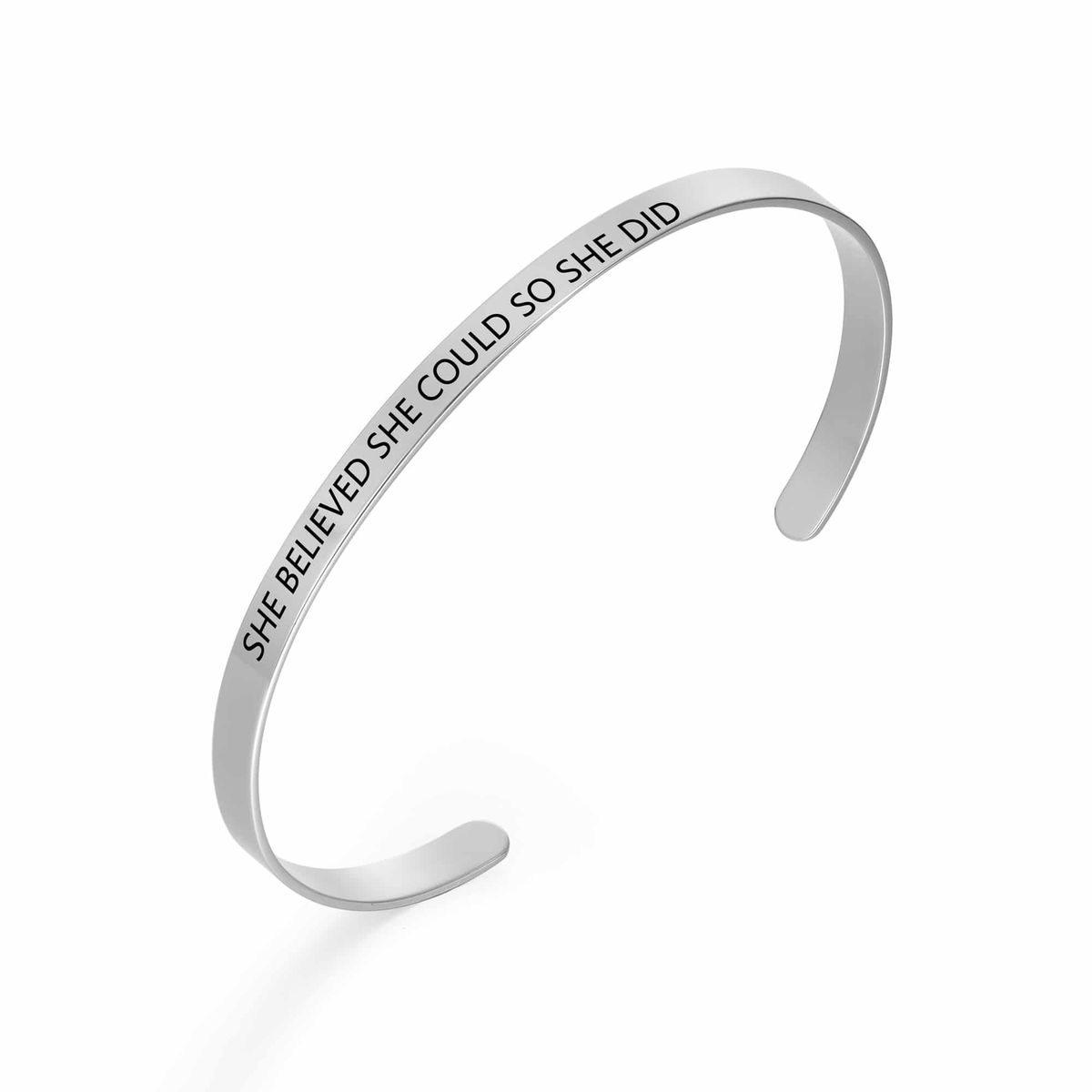 A sterling silver bangle engraved with a wedding date, names and coordinates — a 25th anniversary gift
