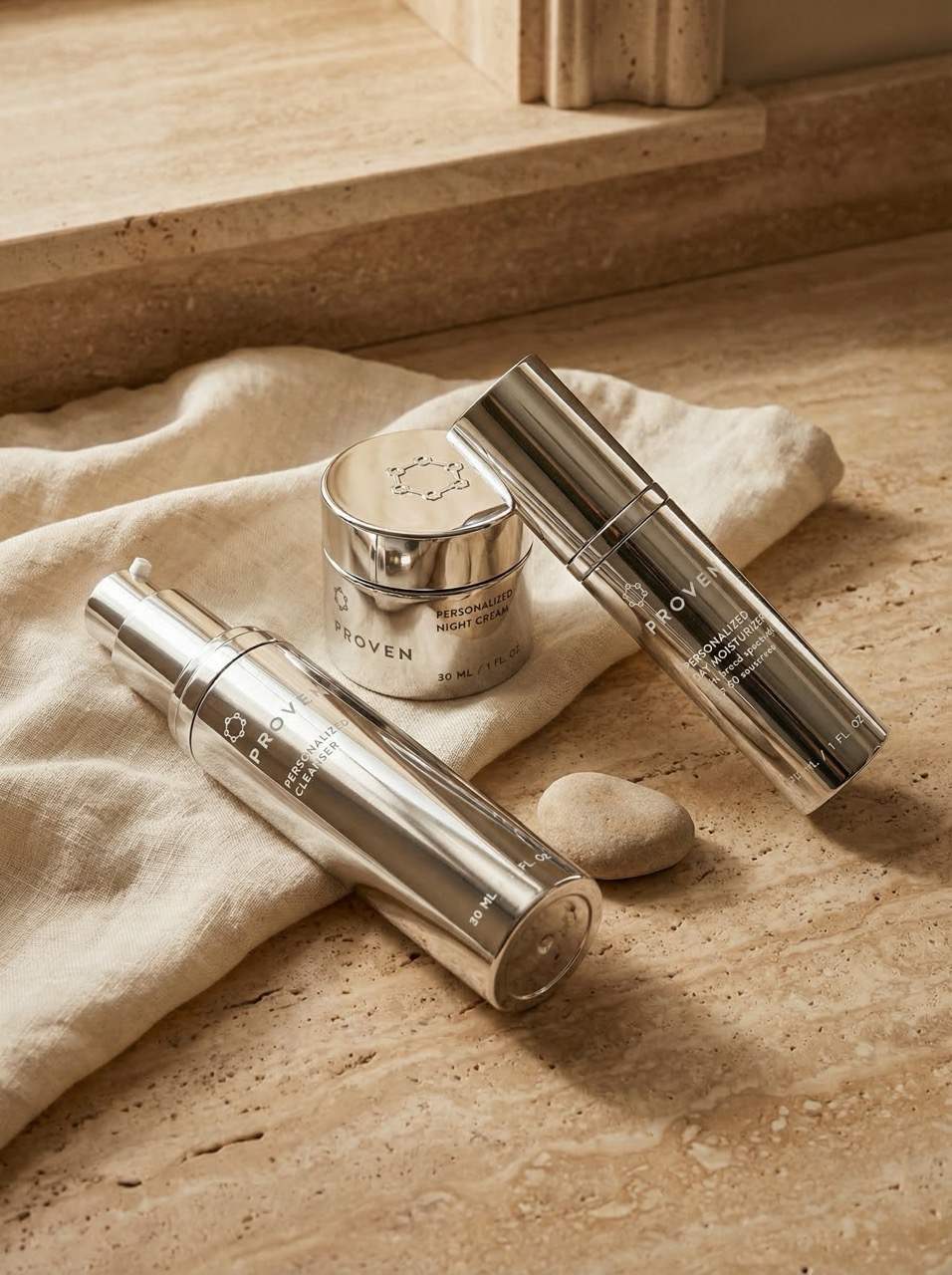 PROVEN personalized skincare system — three bottles tailored to your skin profile.