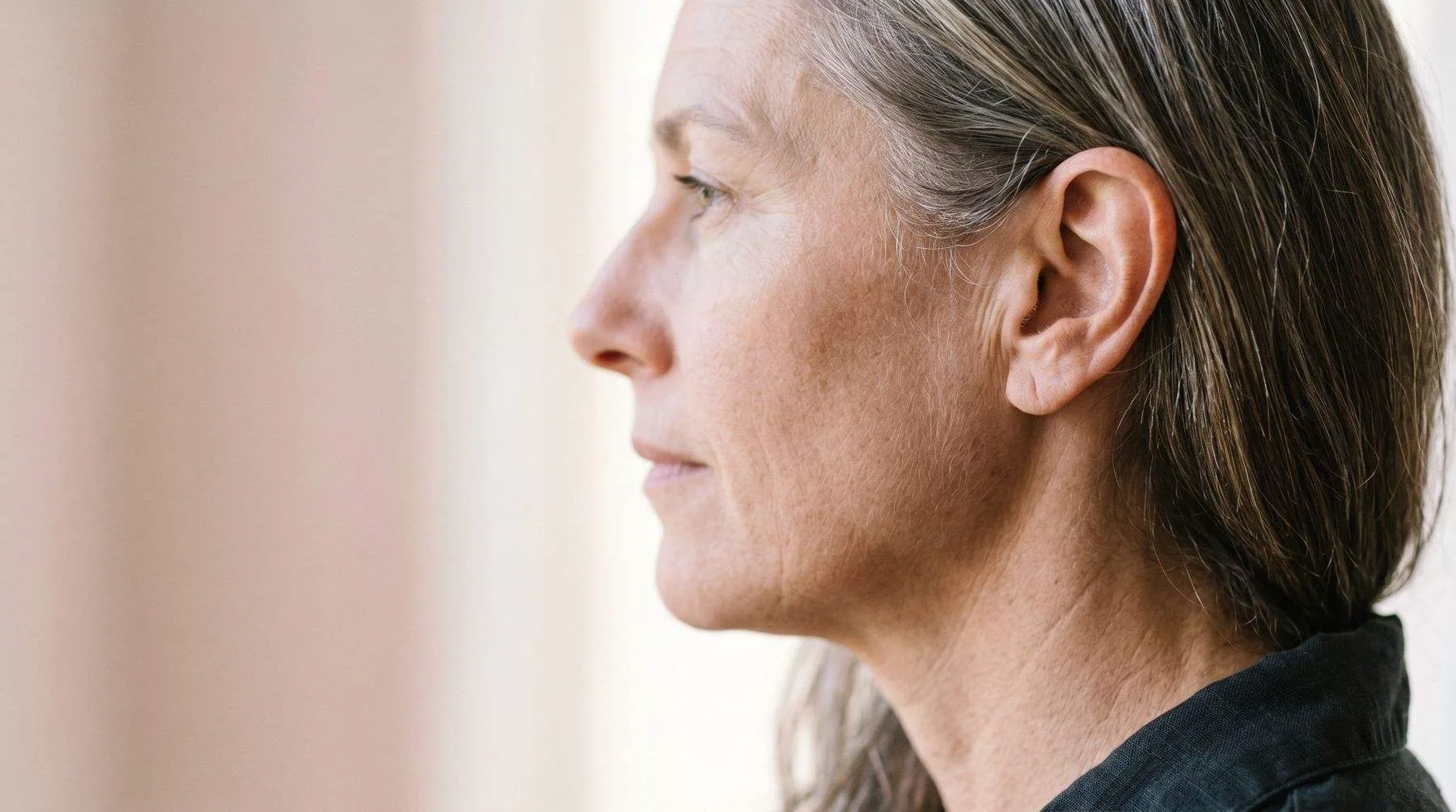 Dry skin in ears — profile close-up of the ear