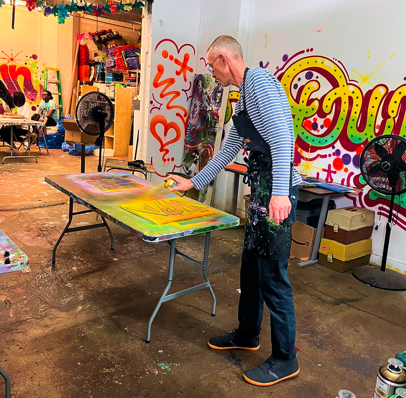 ryan spraypainting in a studio in new york city - beardwood