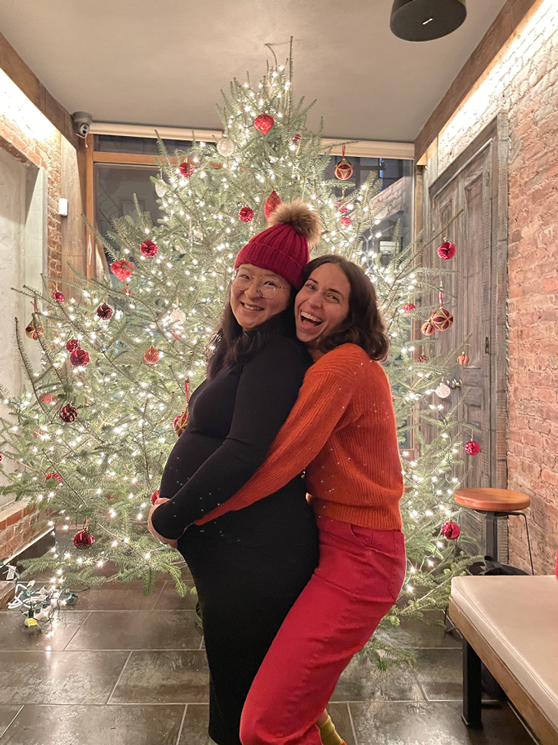 esther and katie in front of a christmas tree in new york city - beardwood