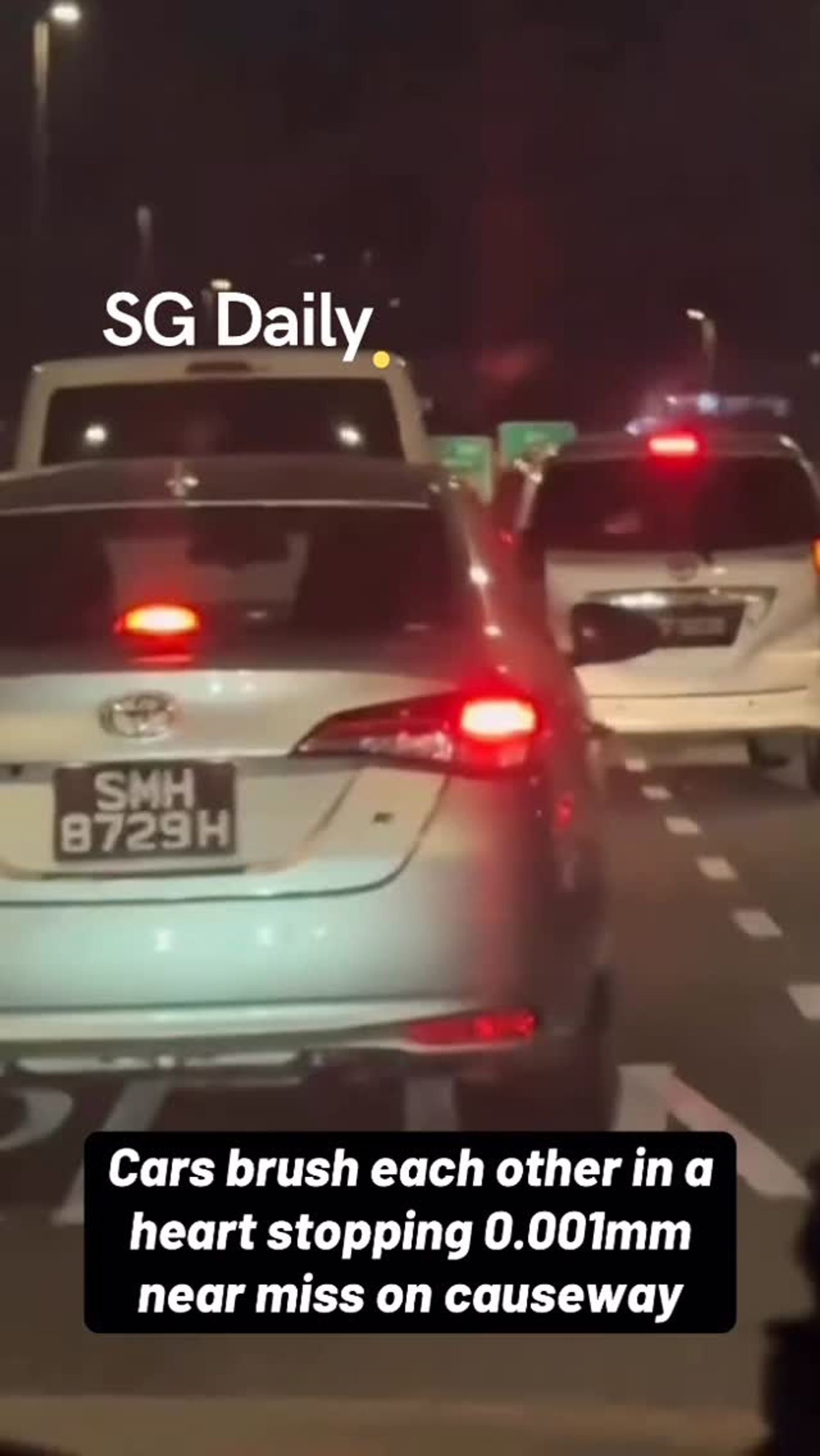 Cars Brush Past Each Other in Causeway Near Miss