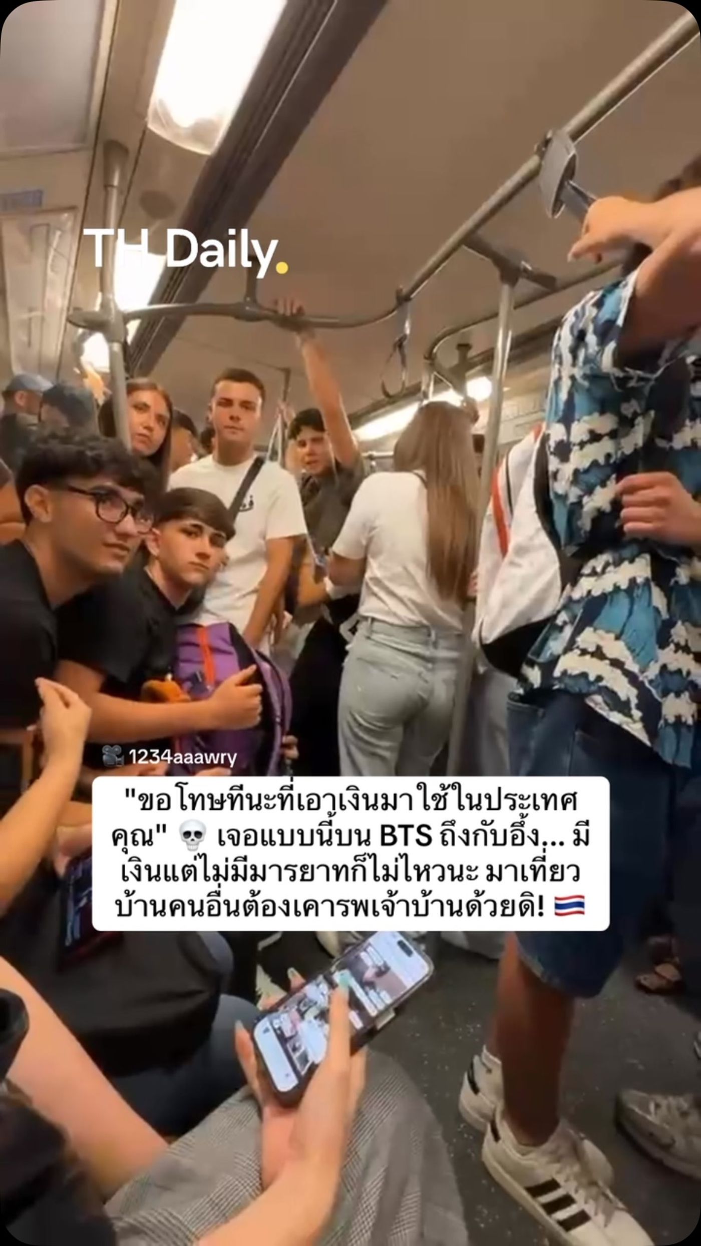 Passengers argue inside crowded Bangkok BTS train