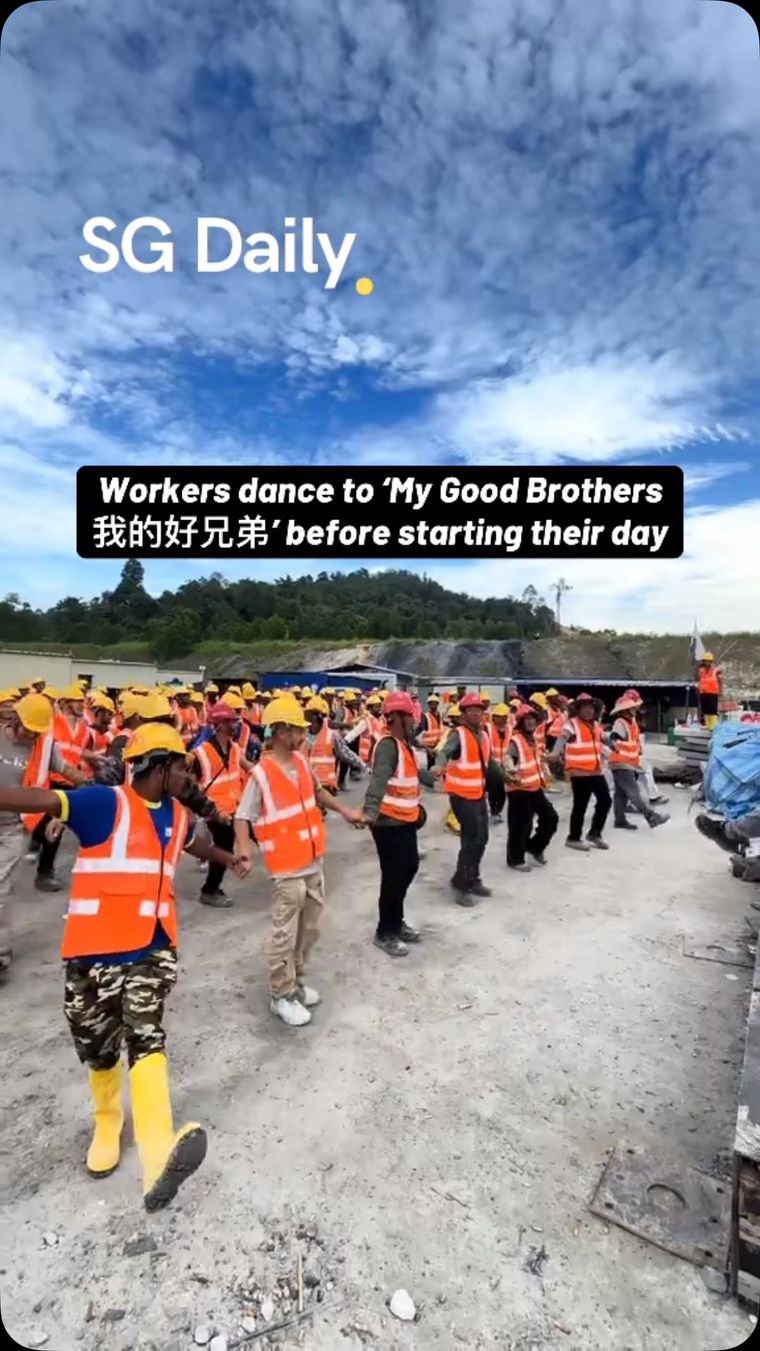 Workers dance to 'My Good Brothers | 我的好兄弟' before starting their day