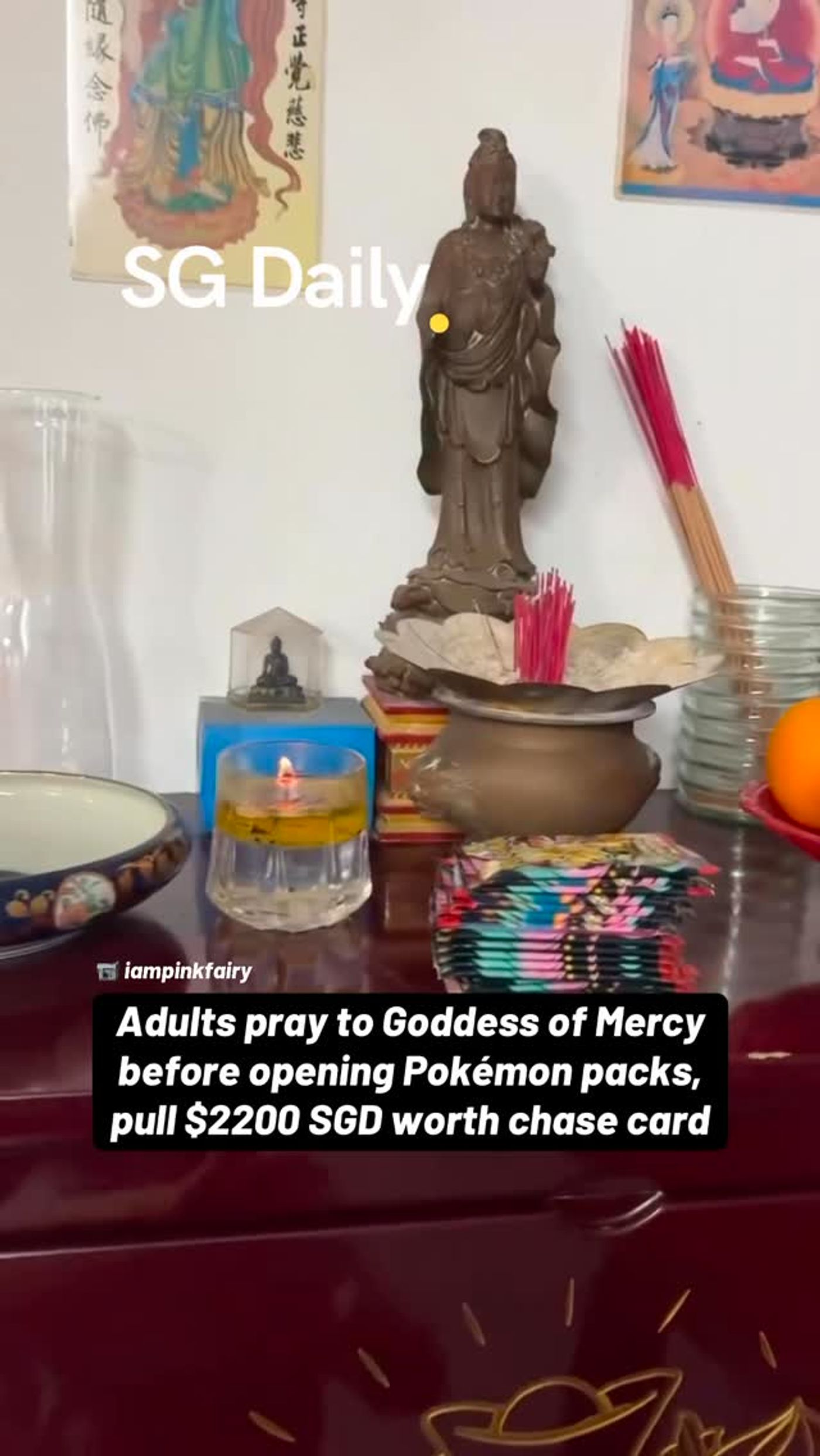 Adults pray to Goddess of Mercy before opening Pokemon packs and pull a $2,200 card