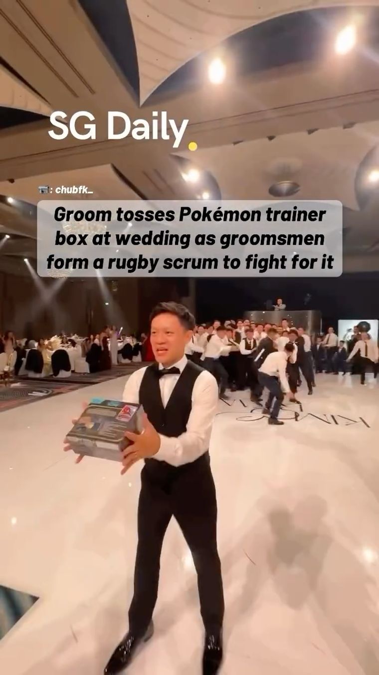Groom throws a Pokemon box at his groomsmen instead of a bouquet