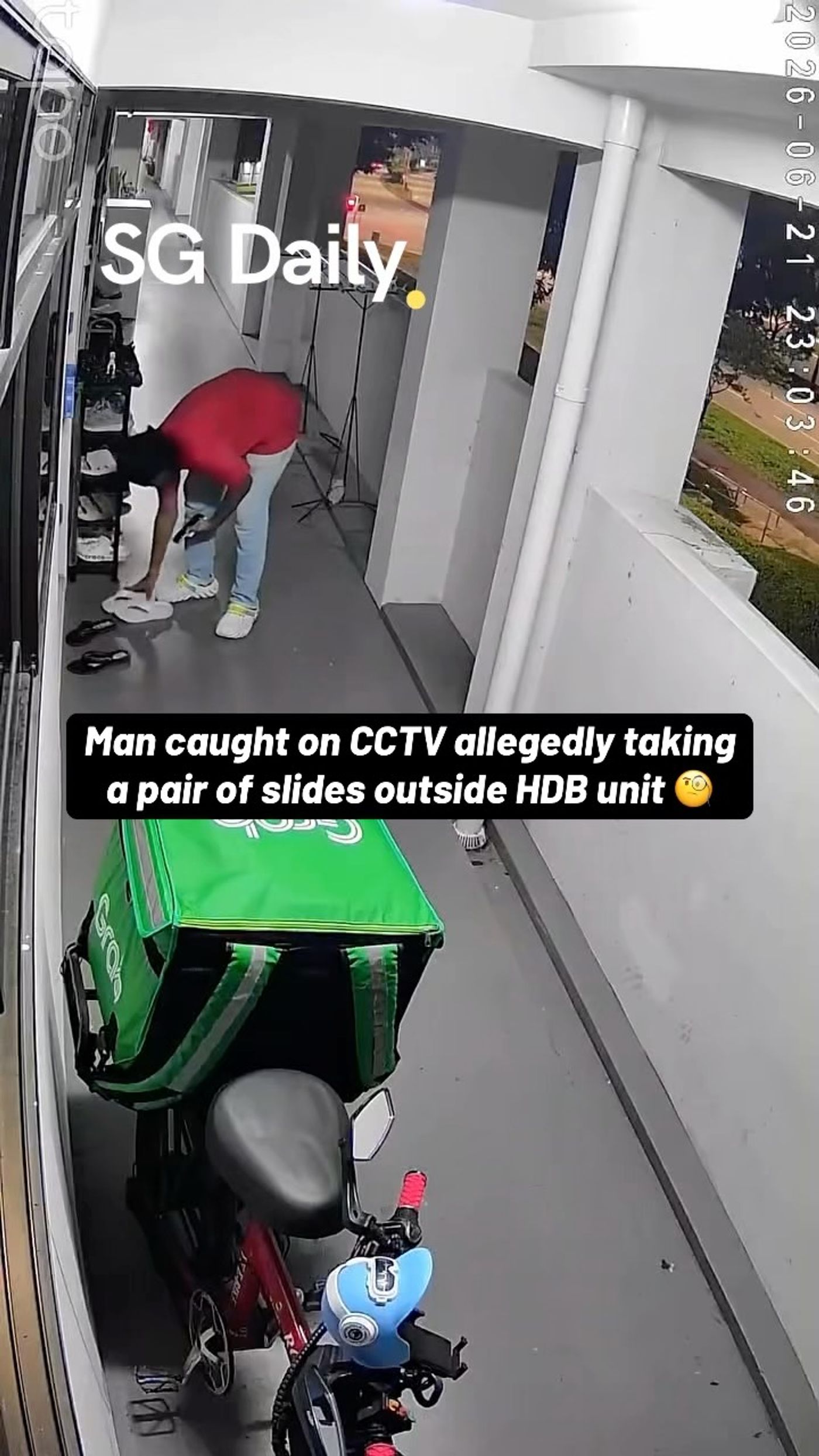 Man caught on CCTV allegedly taking slides outside HDB unit