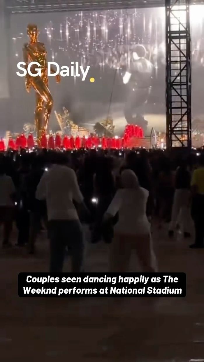 Couples seen dancing happily as The Weeknd performs at National Stadium