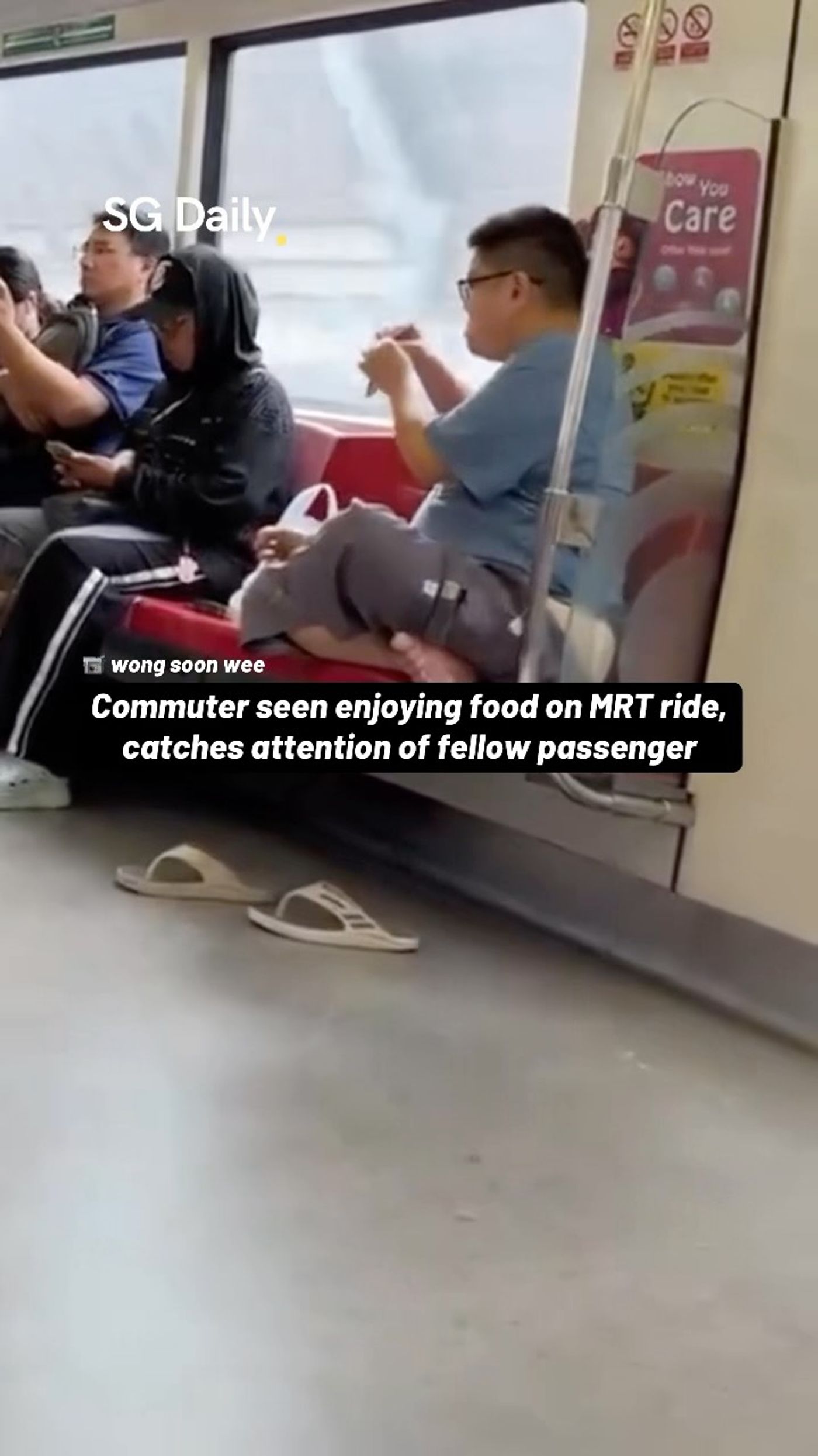 Commuter seen eating during an MRT ride