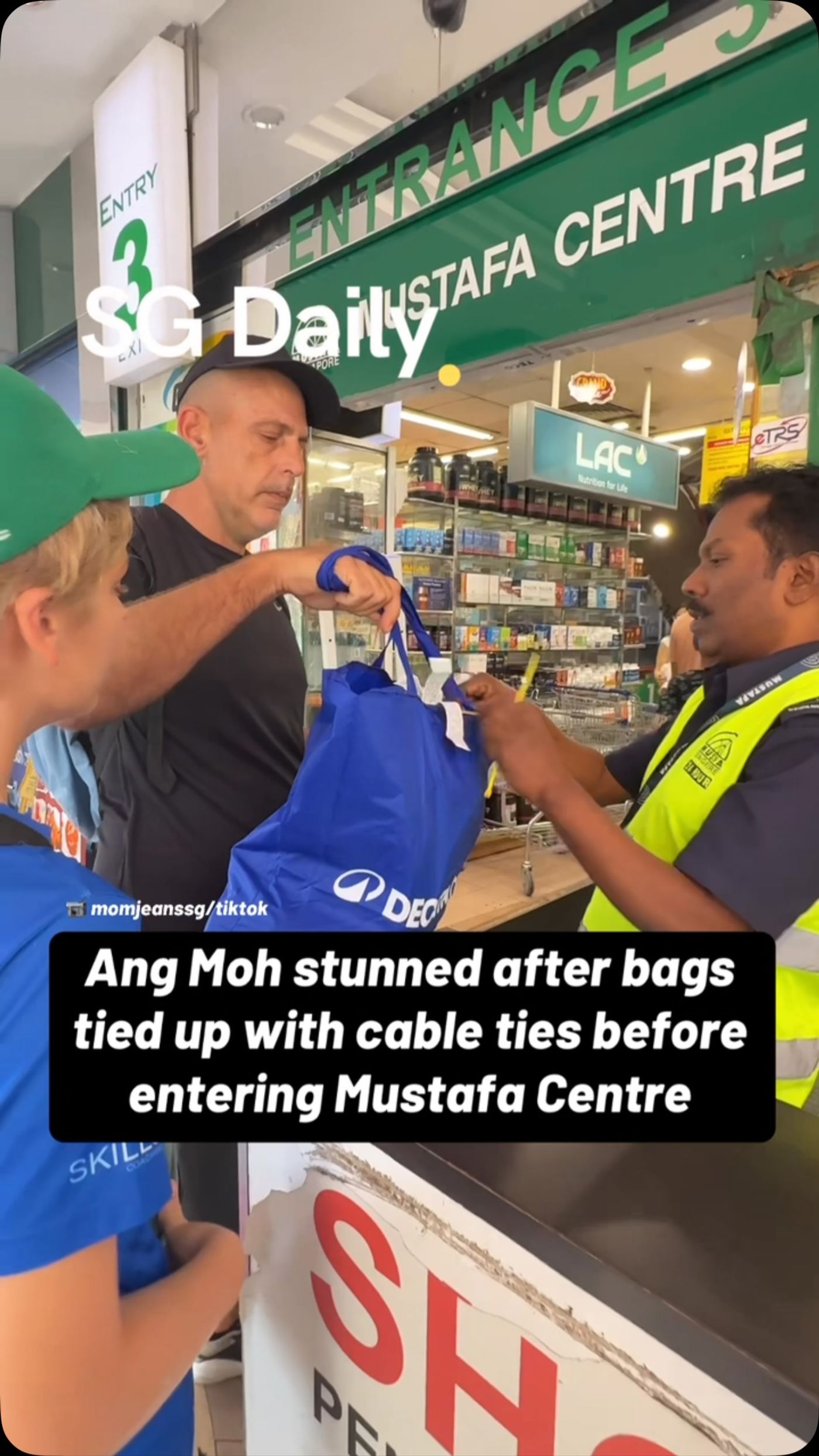 Ang Moh stunned after bags tied up with cable ties before entering Mustafa Centre