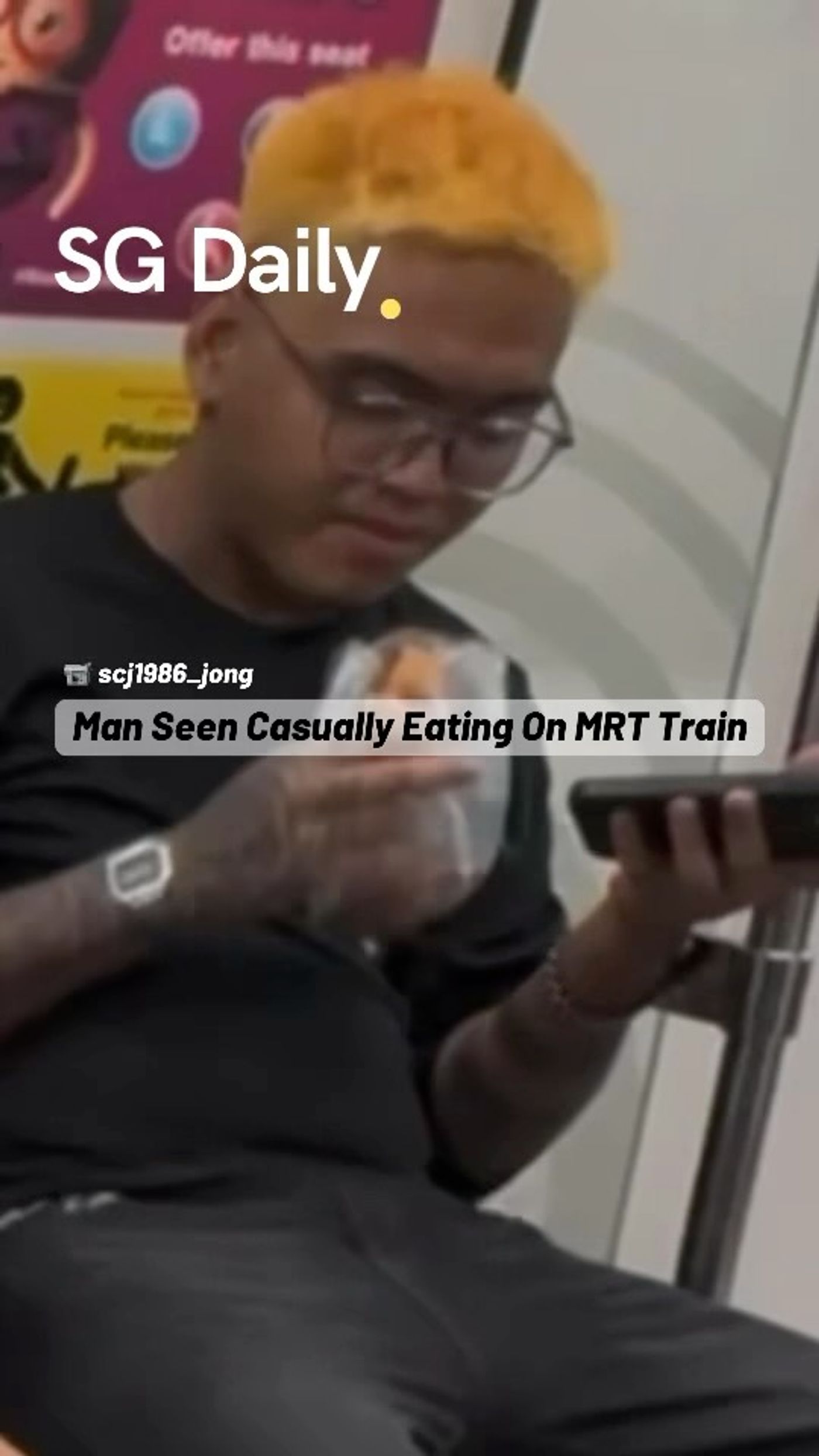 Man seen casually eating on MRT train