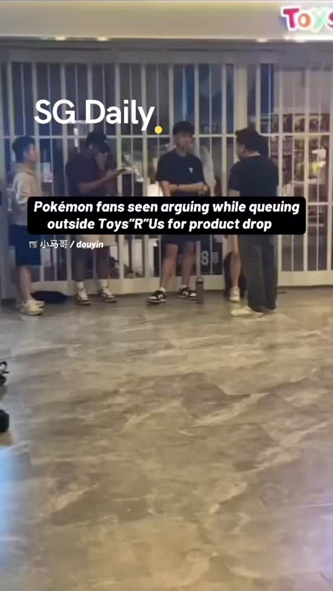 Pokémon fans seen arguing while queuing outside Toys"R"Us for product drop