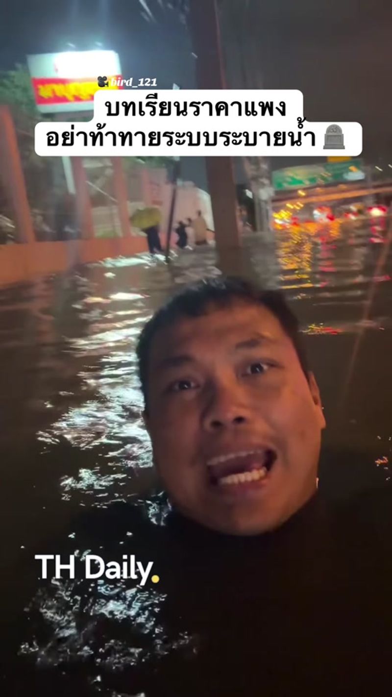 Flooded-street clip jokes about challenging the drainage system