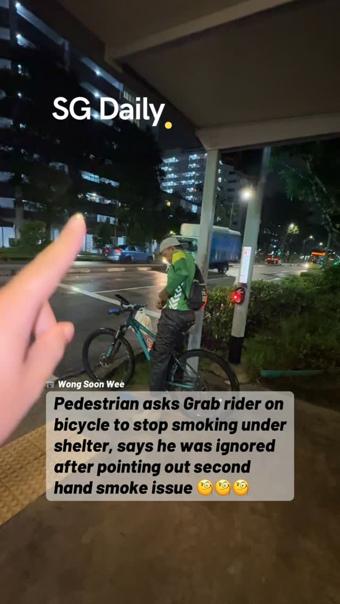 Pedestrian says Grab rider ignored request to stop smoking under shelter