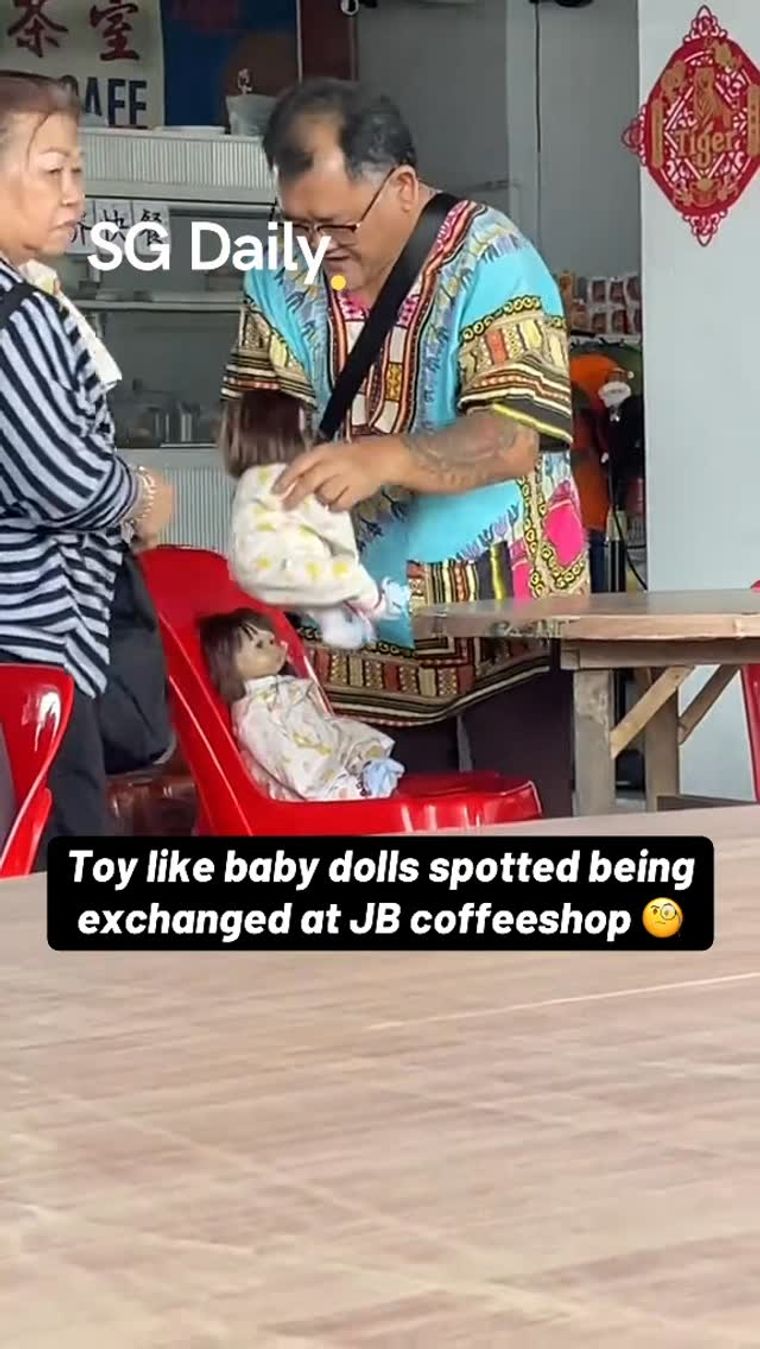 Toy-like baby dolls spotted being exchanged at JB coffeeshop