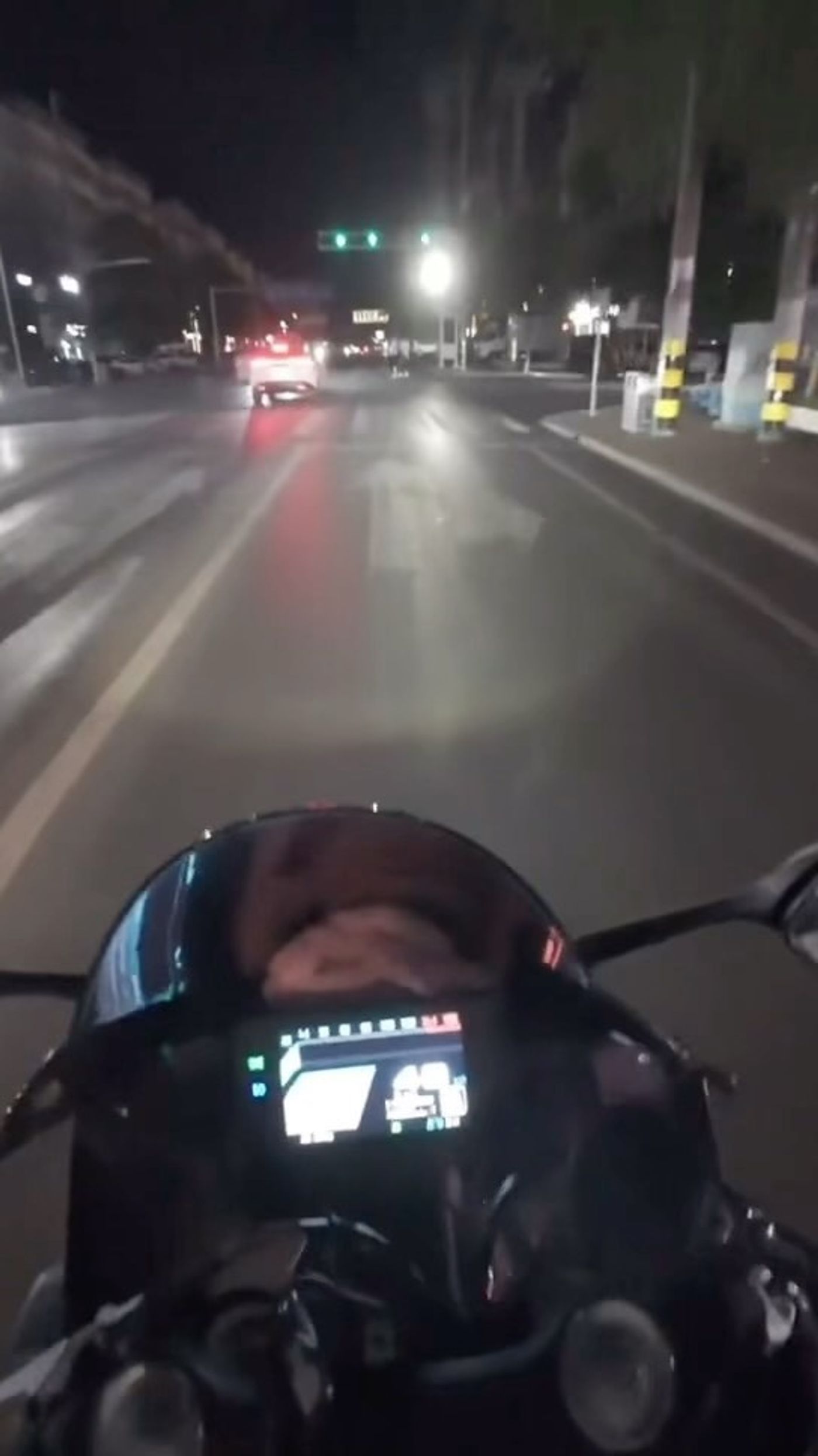 Motorcyclist in China Collides With Oncoming Left-Turning Vehicle