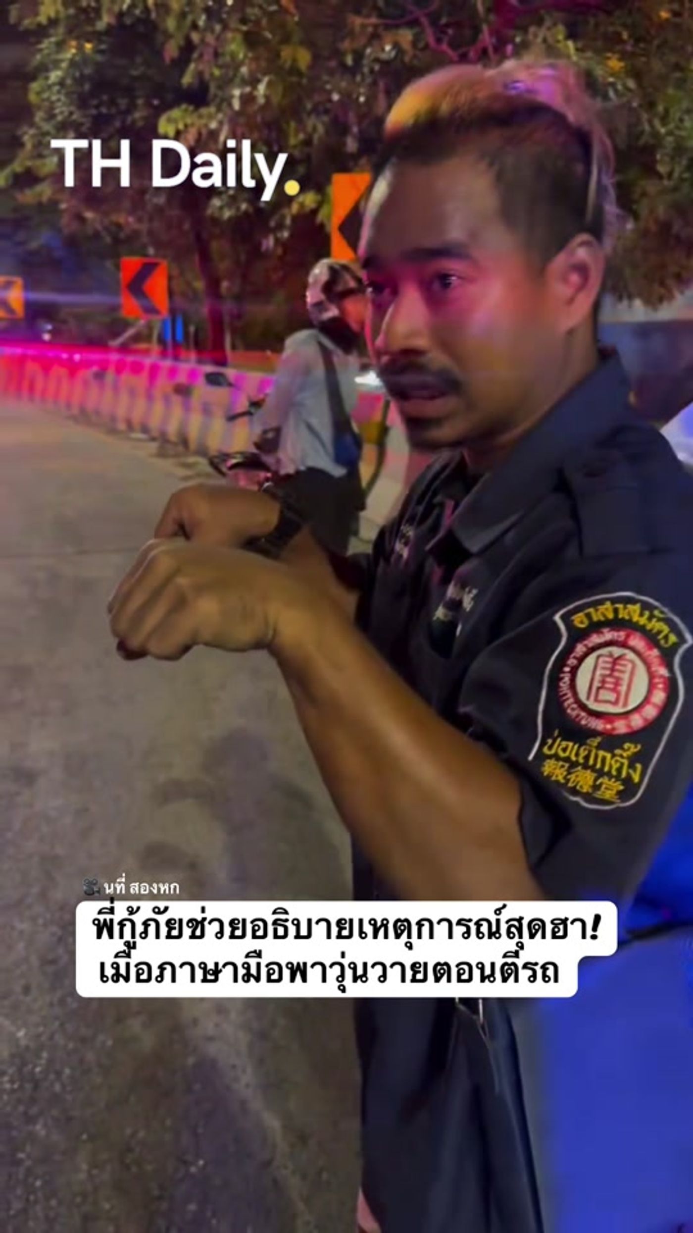 Rescue volunteer tells a story with animated hand gestures