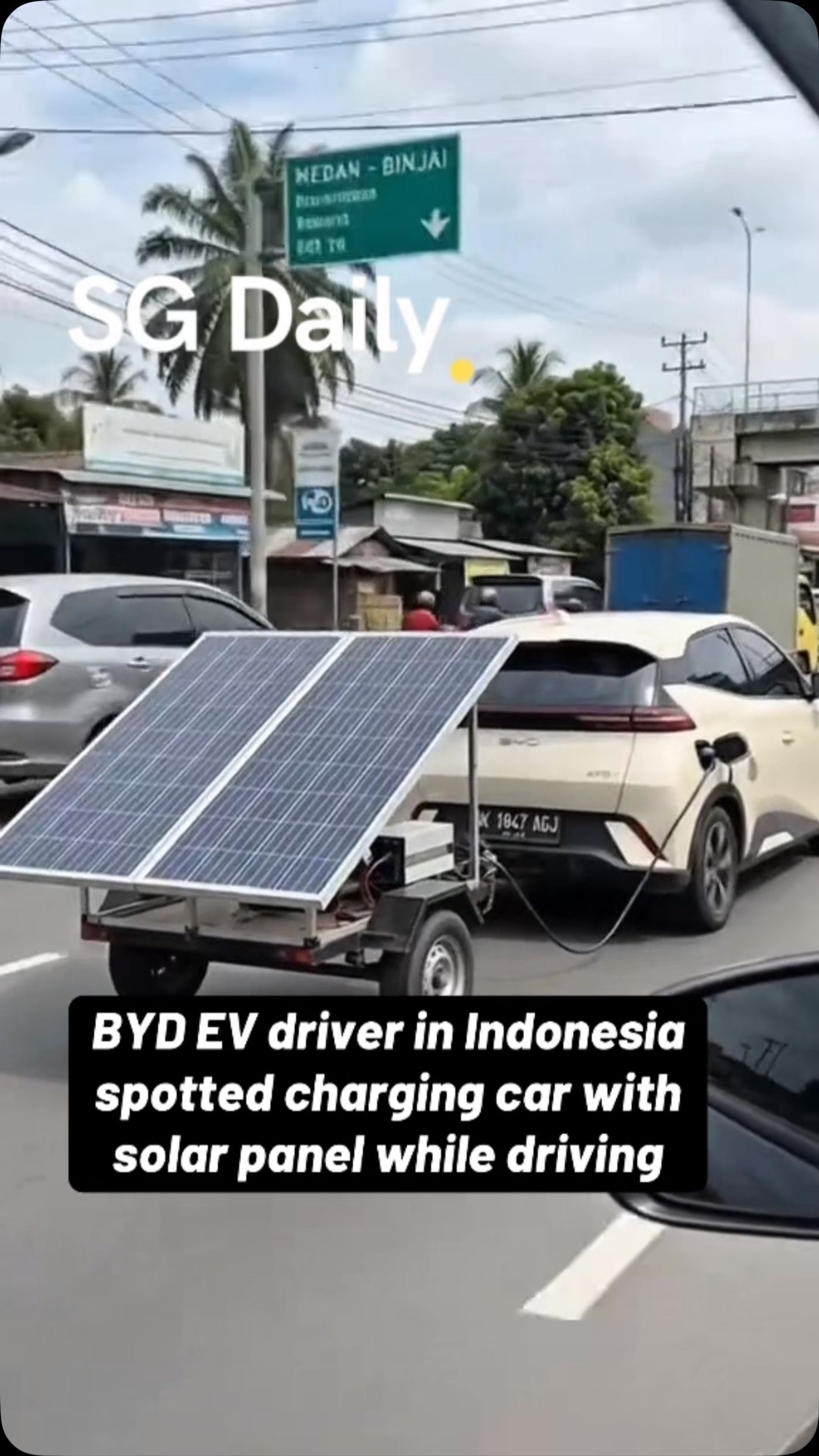 BYD EV driver in Indonesia appears to charge car with solar panels while driving