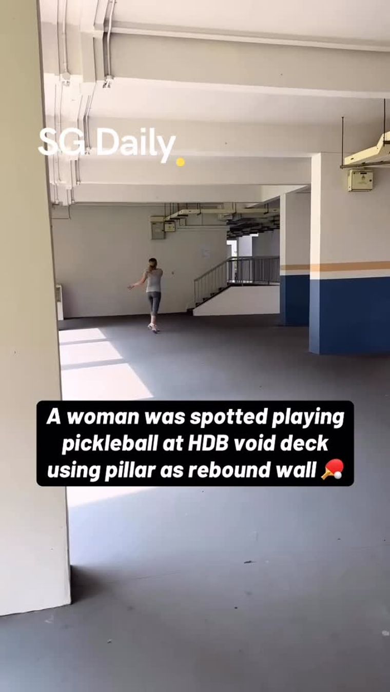 Woman spotted playing pickleball at HDB void deck using pillar as rebound wall