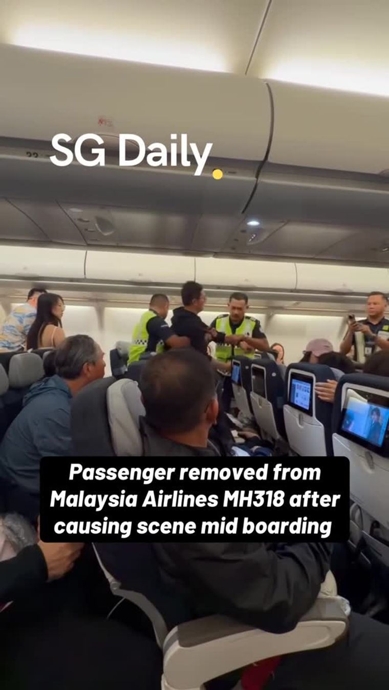 Passenger escorted off Malaysia Airlines flight MH318 before departure