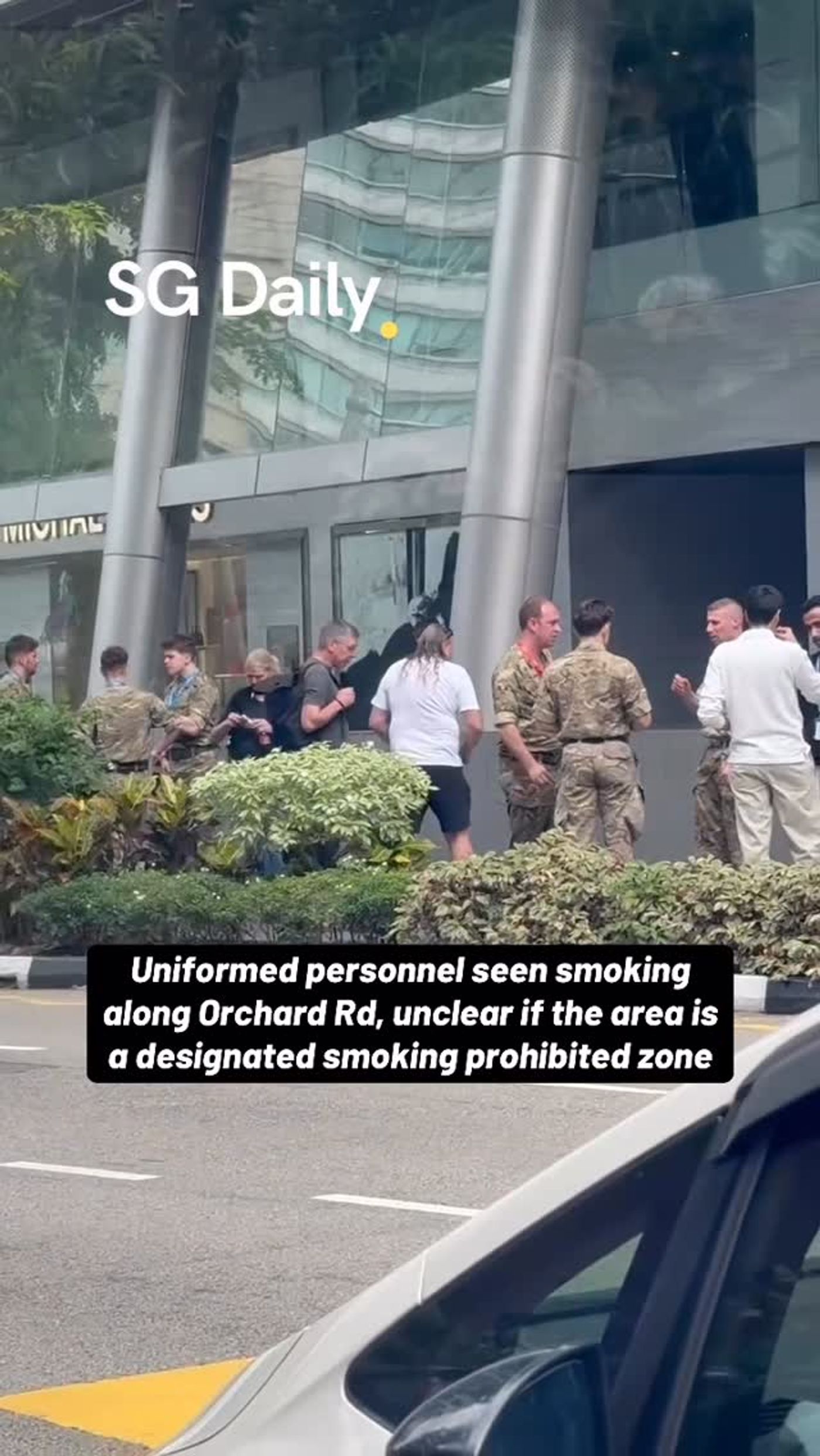 Uniformed personnel seen smoking along Orchard Road