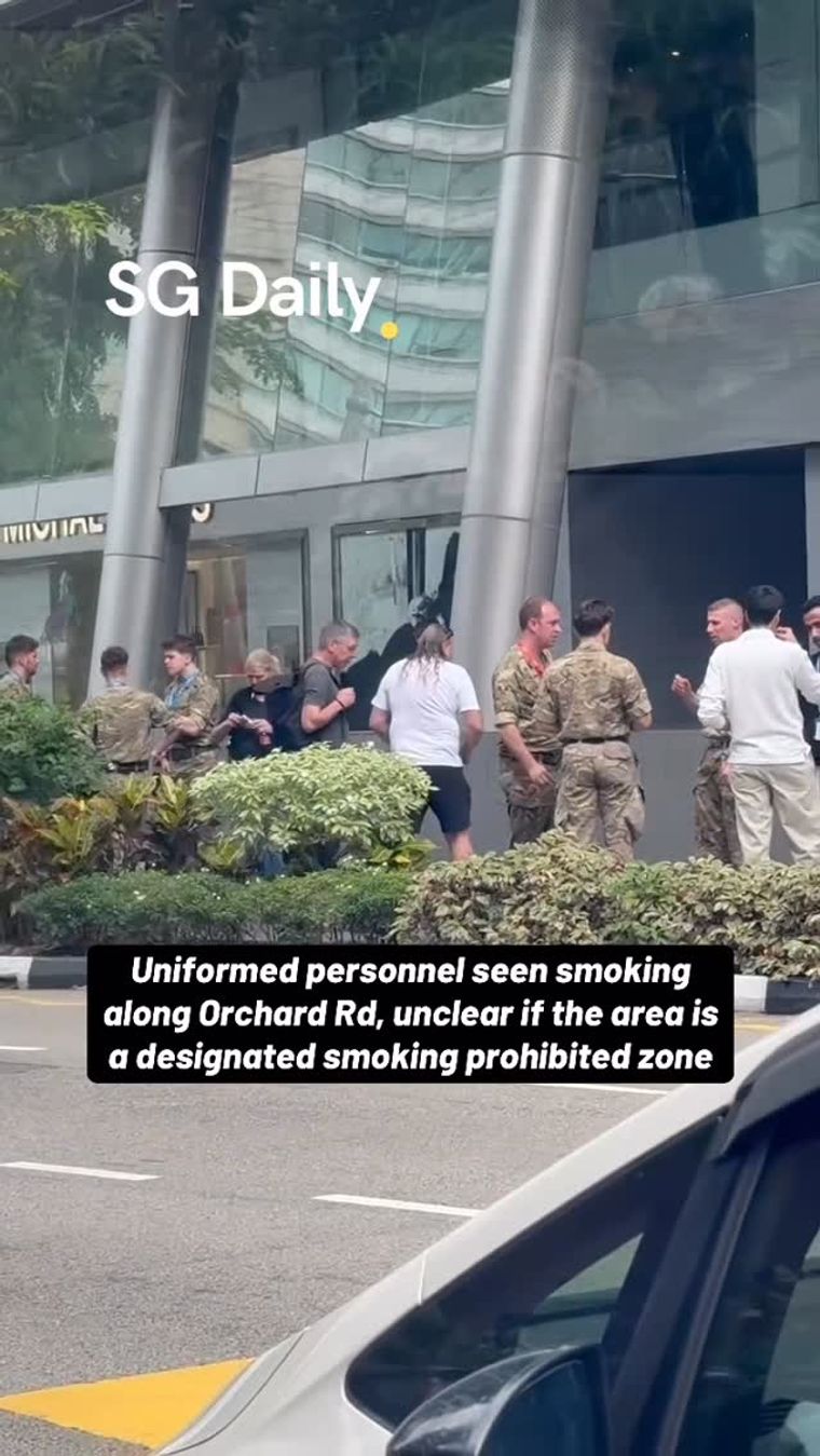 Uniformed personnel seen smoking along Orchard Road