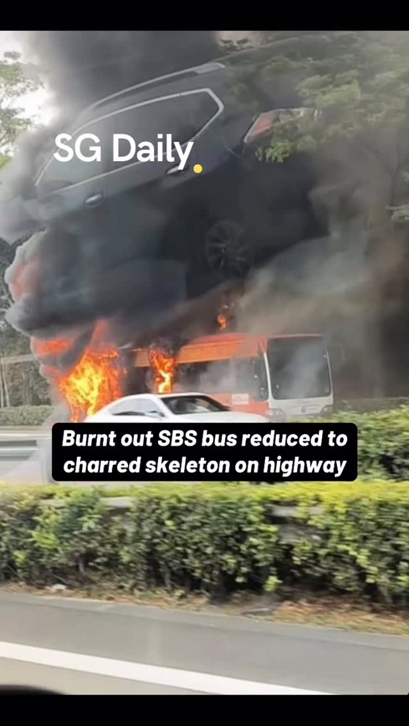 Burnt out SBS bus reduced to charred skeleton on highway