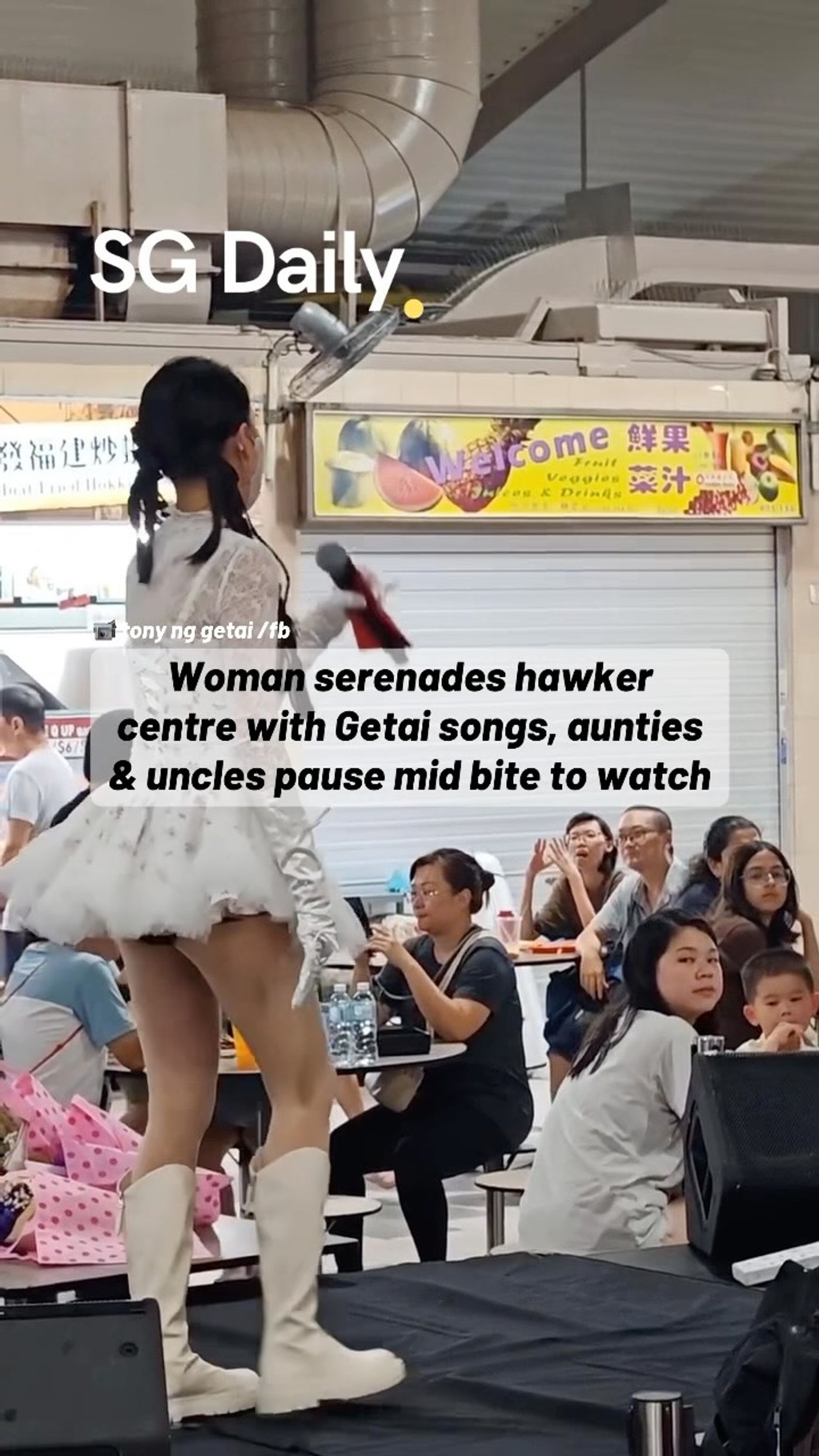 Woman serenades hawker centre with Getai songs as diners pause mid-bite