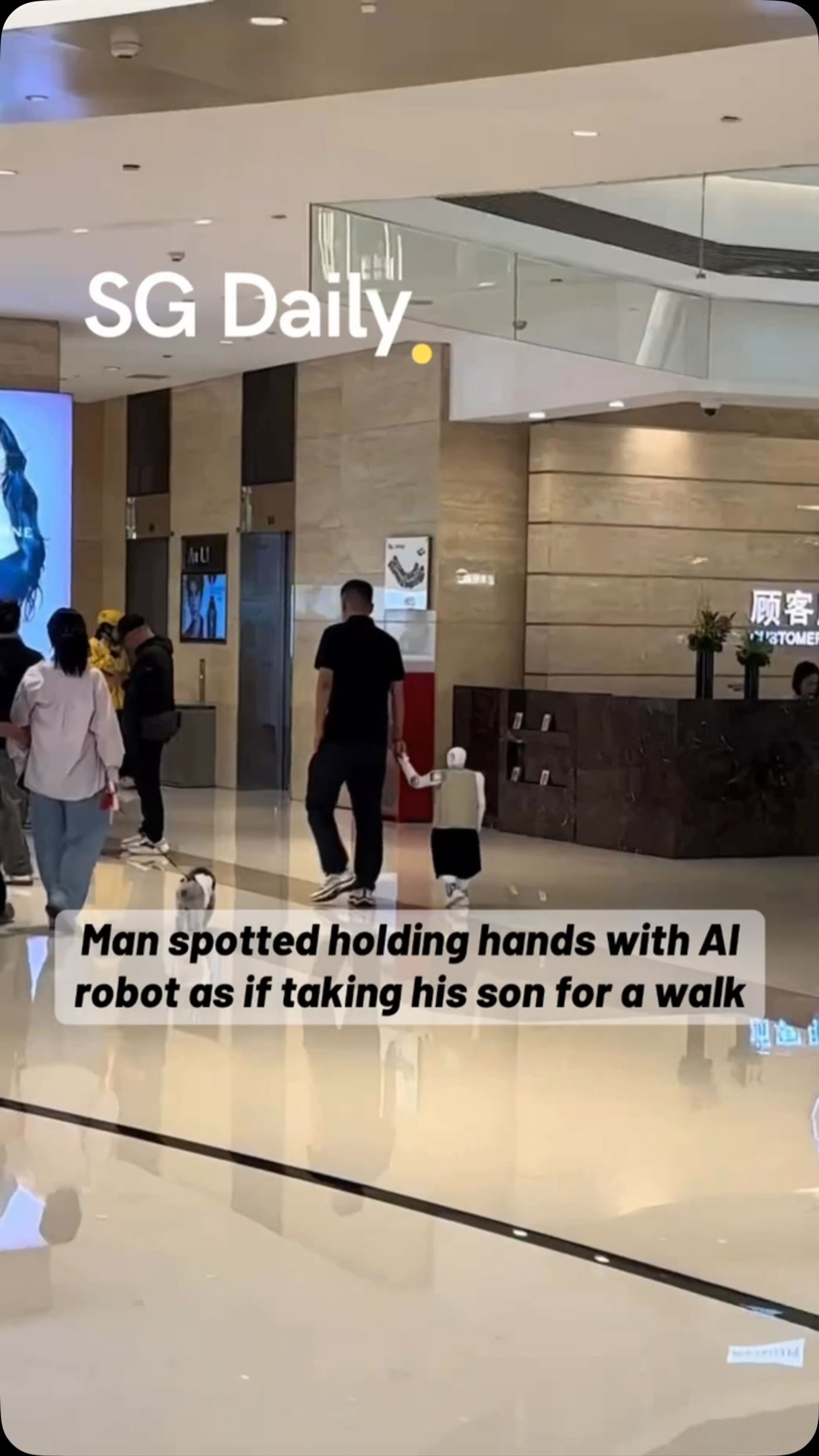 Man spotted holding hands with AI robot as if taking his son for a walk