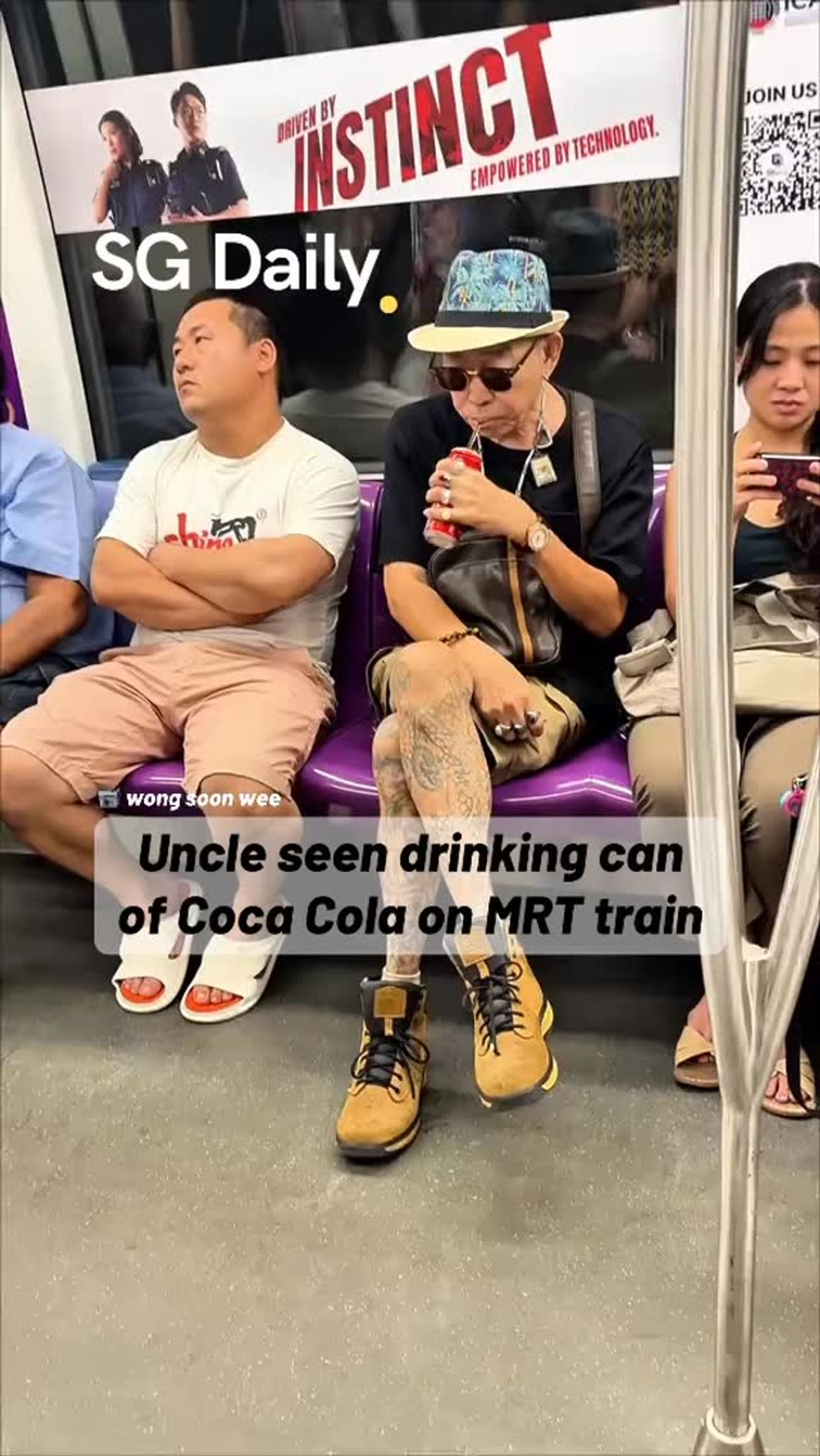Uncle seen drinking can of Coca Cola on MRT train