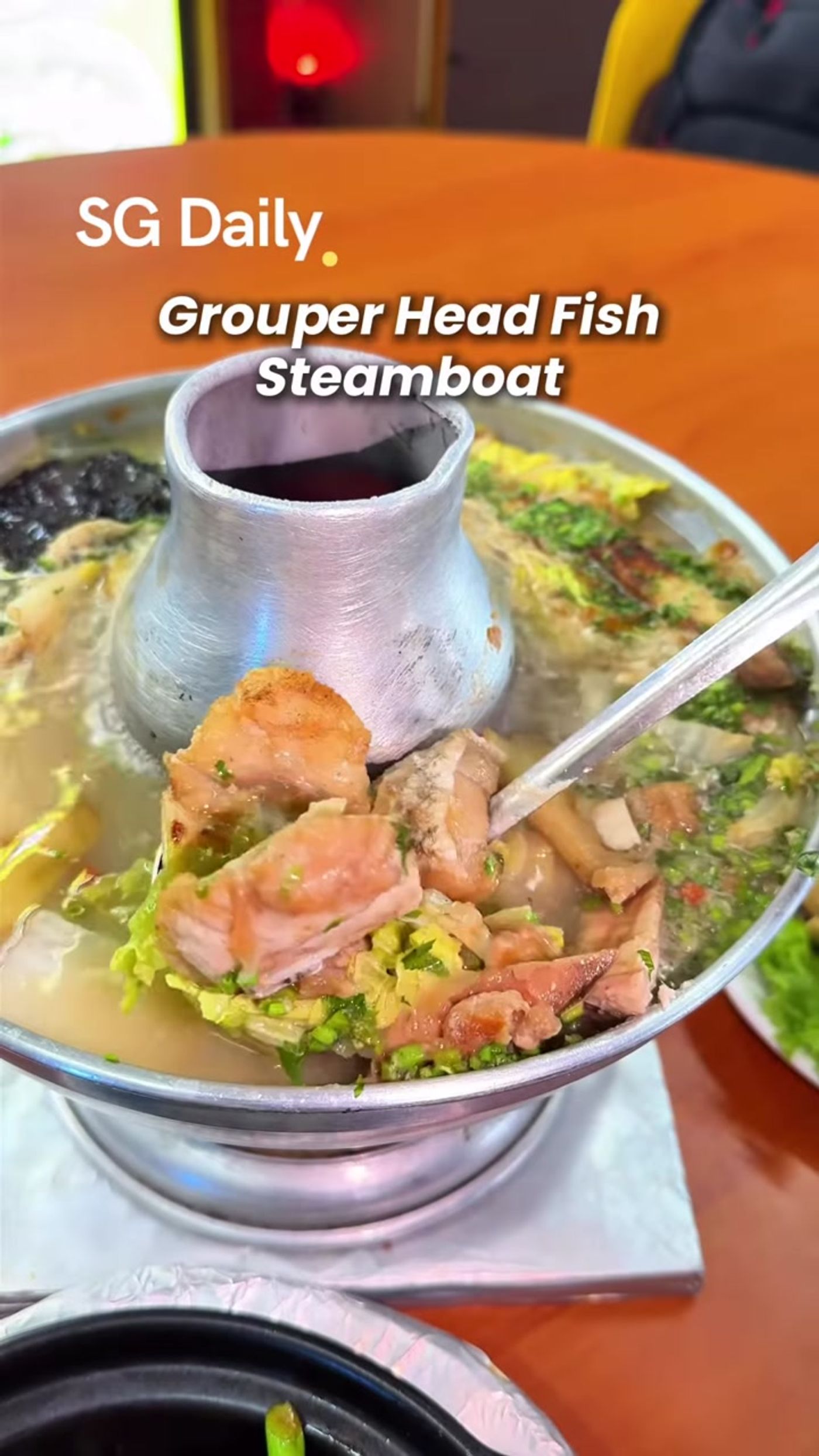 Red grouper fish head charcoal steamboat at Hong Li Seafood