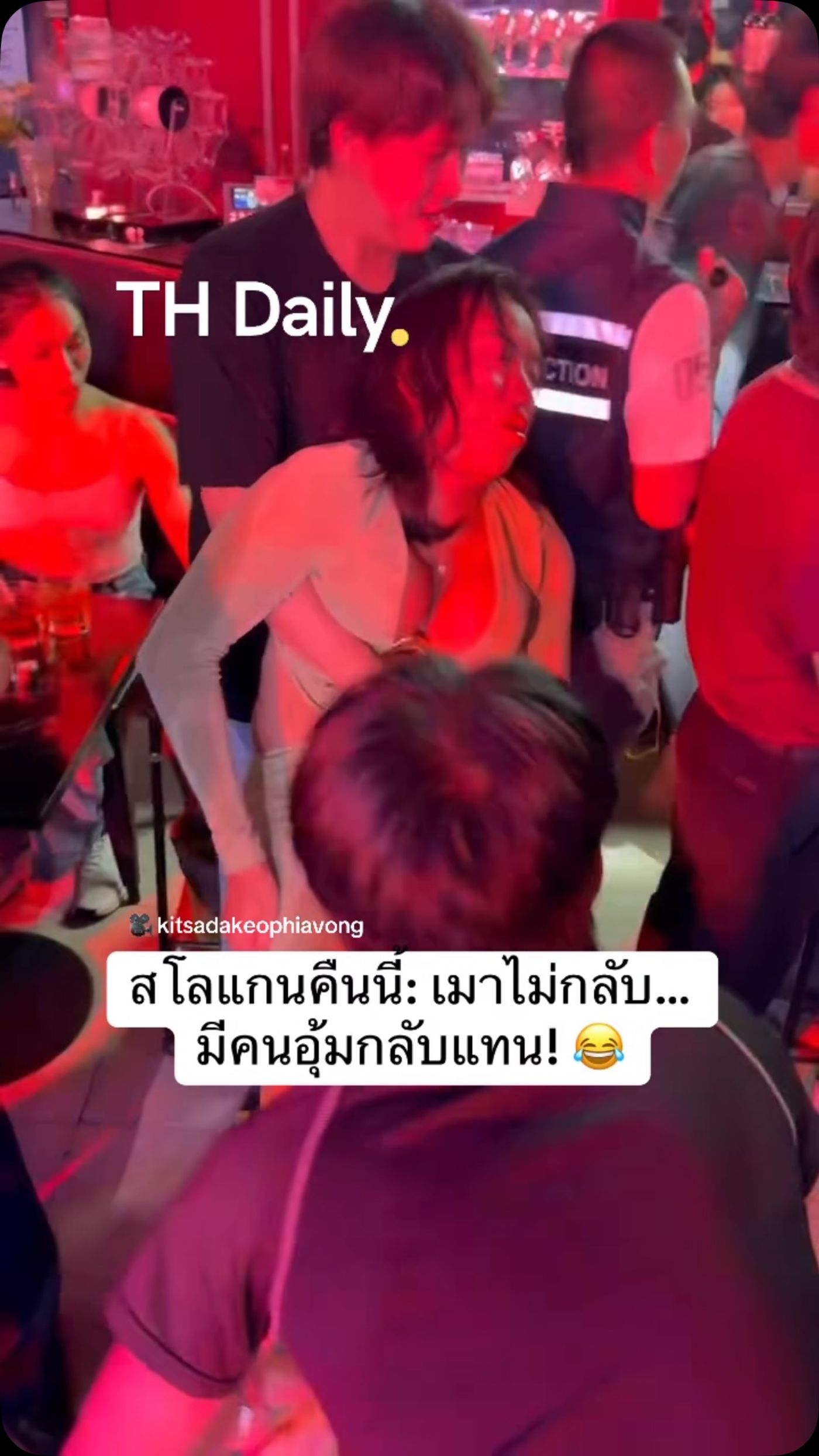 Venue staff help an unsteady guest to safety