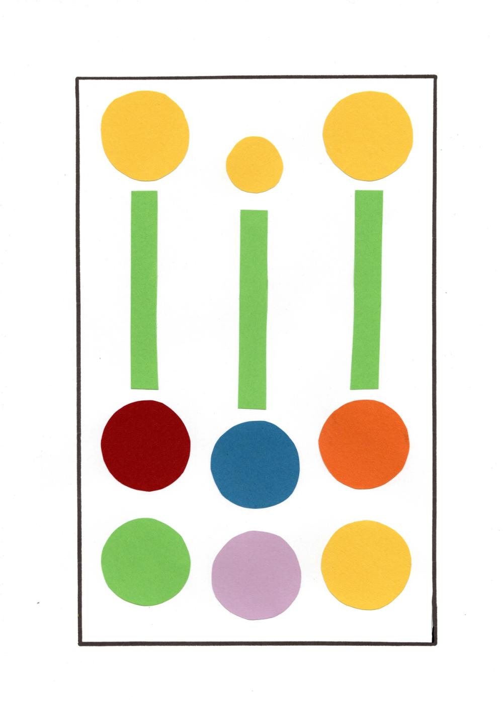 Green paper stems topped with yellow discs above two rows of red, blue, orange and lilac circles