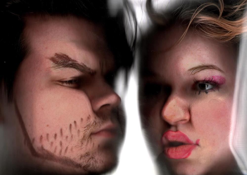 Scanned profiles nose to nose: a man with drawn-on brow and stubble facing pink eyeshadow and glossy red lips
