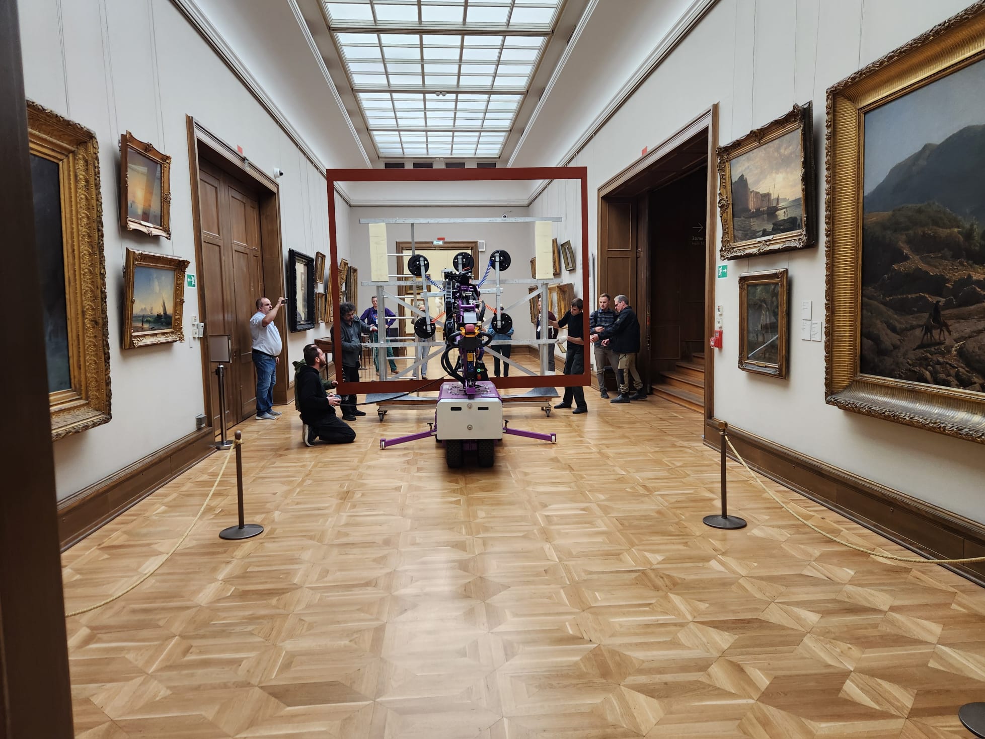 Quattrolifts glass lifter in a grand skylit museum painting gallery during a glass panel installation