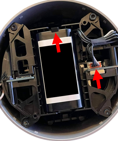 Release the clips securing the battery, and remove it from the device