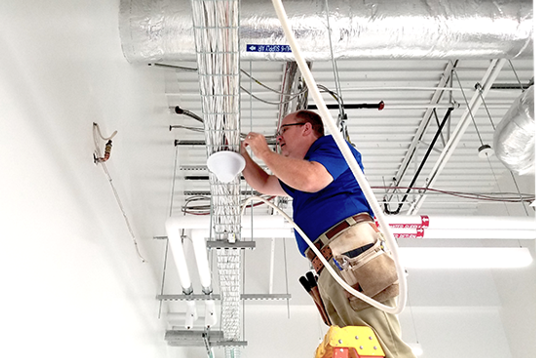 RSRF Engineer Installing DAS Antenna