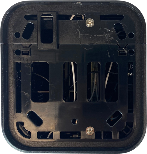 Remove the two phillips-head screws securing the outer covers to the inner unit
