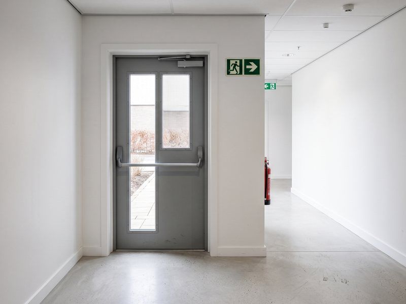 A clear, unobstructed emergency exit route in a public building