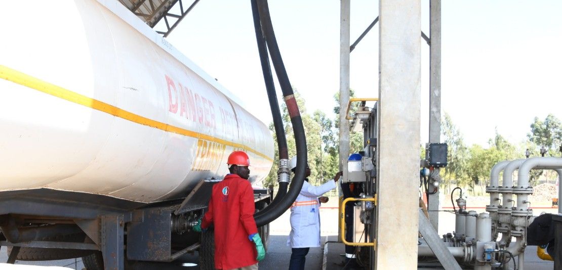 A fuel truck fueling at a filling station 